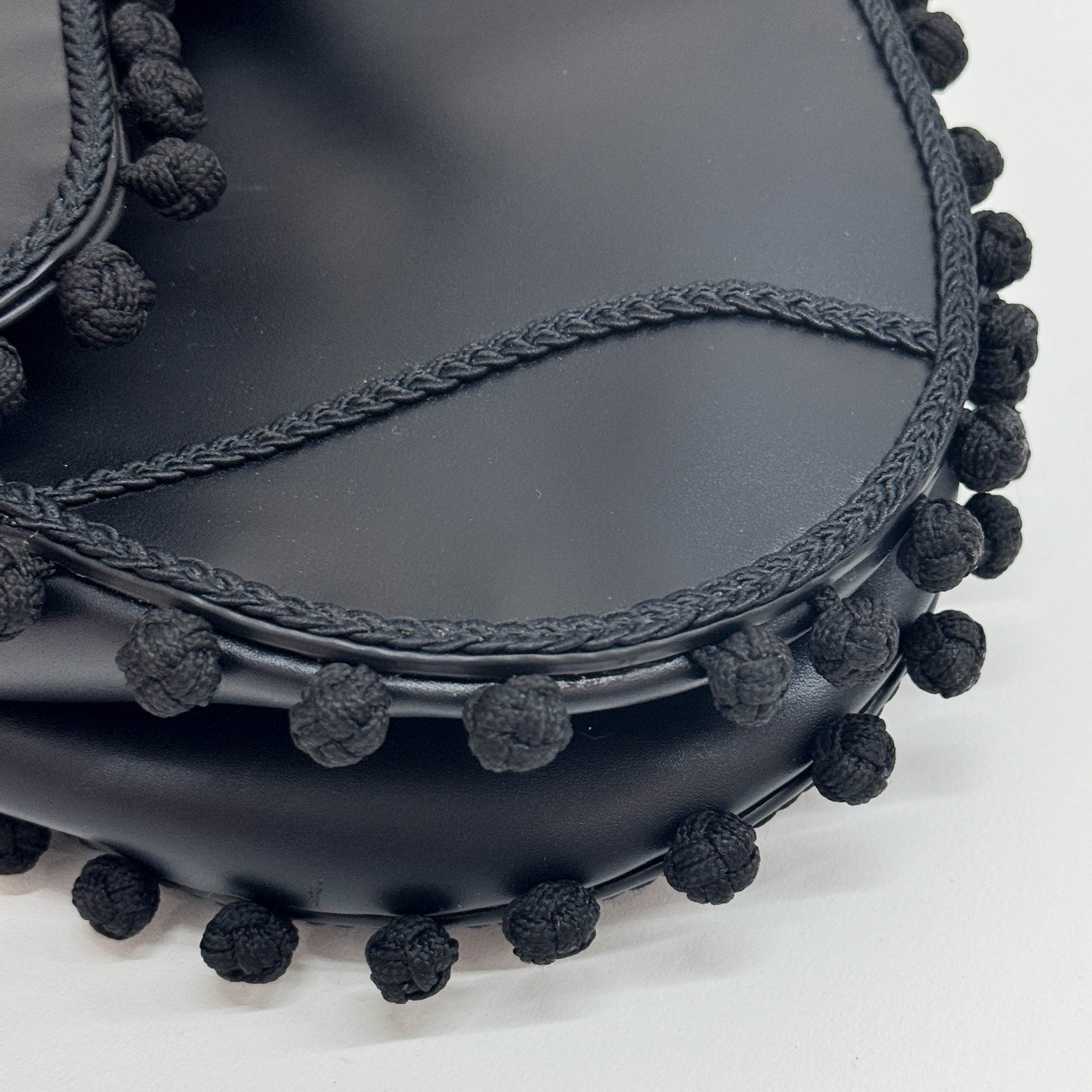 Saddle Braided Pom Pom Trim Black Leather Shoulder Bag