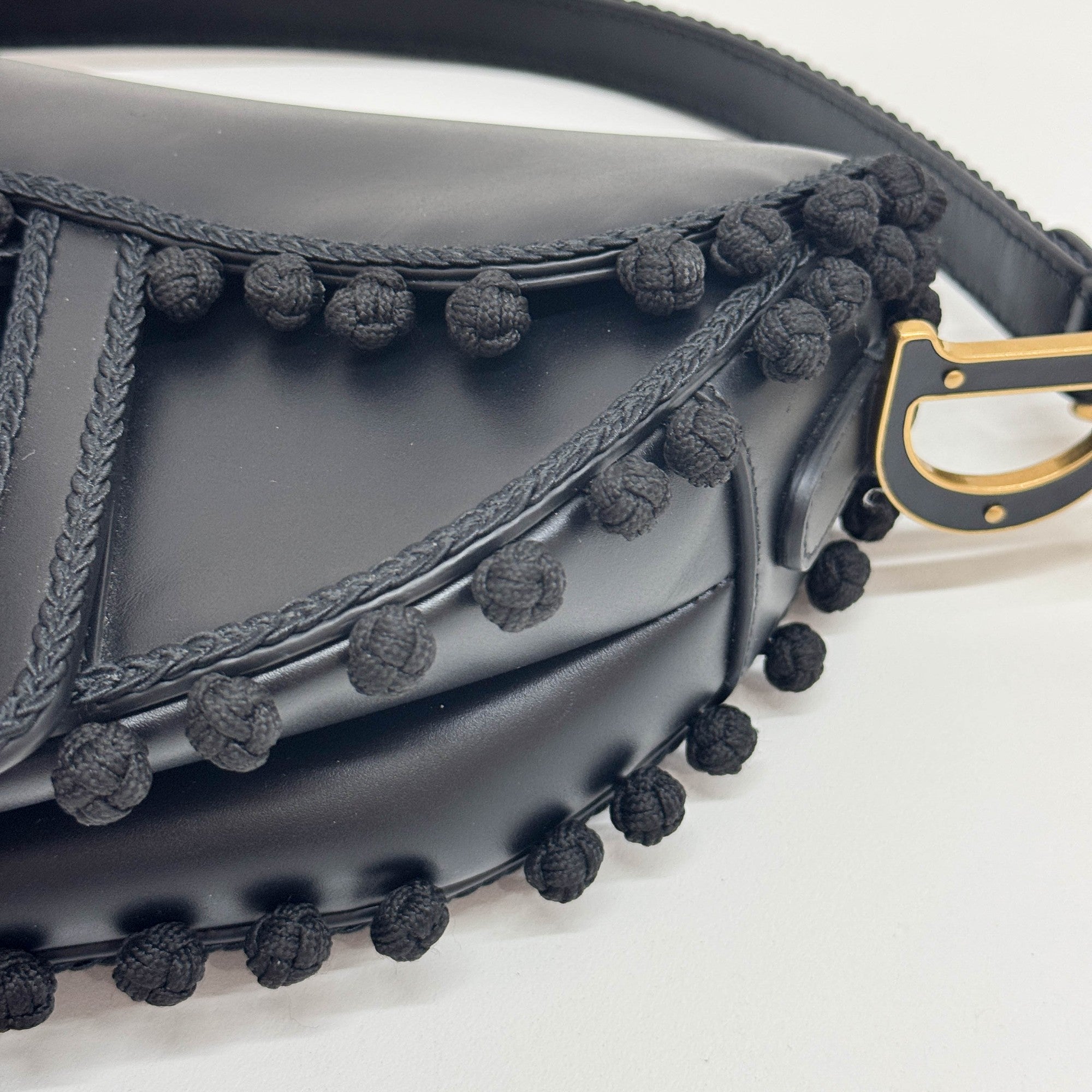 Saddle Braided Pom Pom Trim Black Leather Shoulder Bag