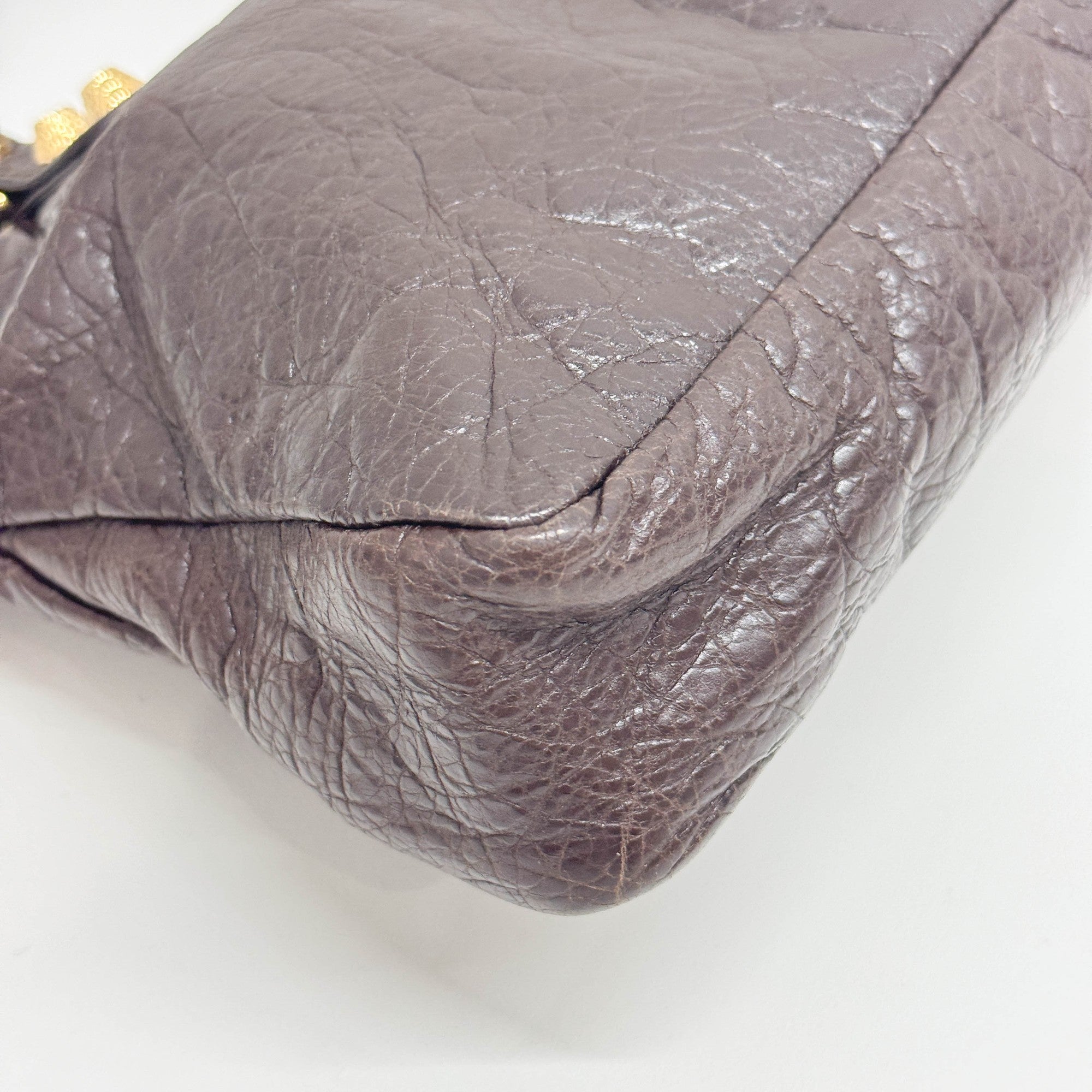 The First in Brown Leather and Gold Hardware Shoulder Bag