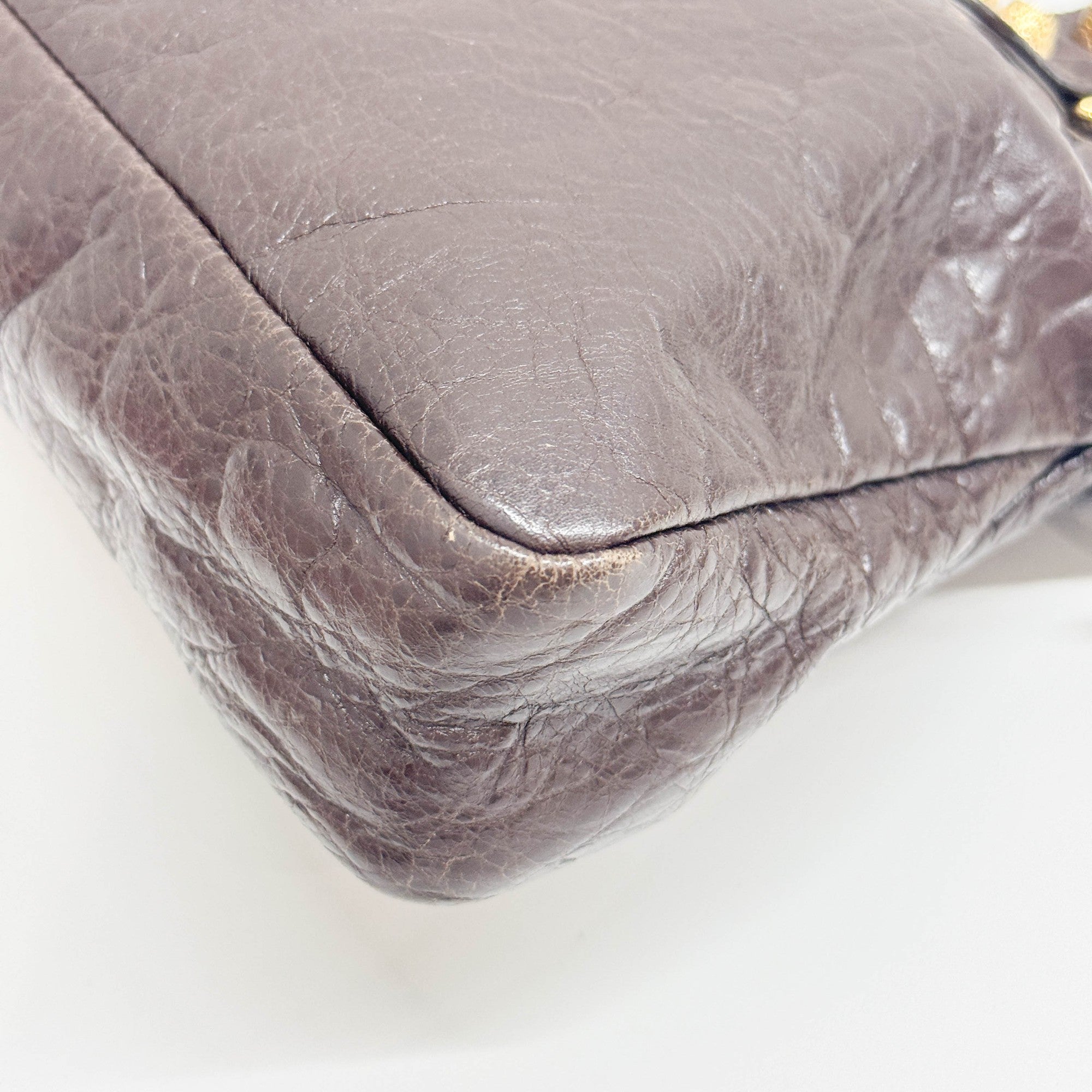 The First in Brown Leather and Gold Hardware Shoulder Bag