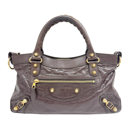 The First in Brown Leather and Gold Hardware Shoulder Bag