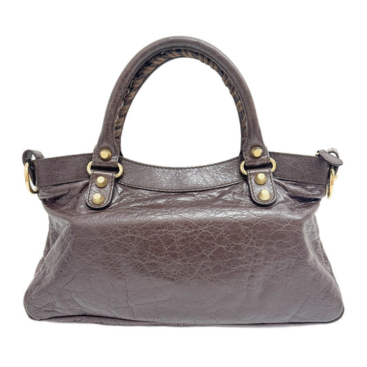 The First in Brown Leather and Gold Hardware Shoulder Bag