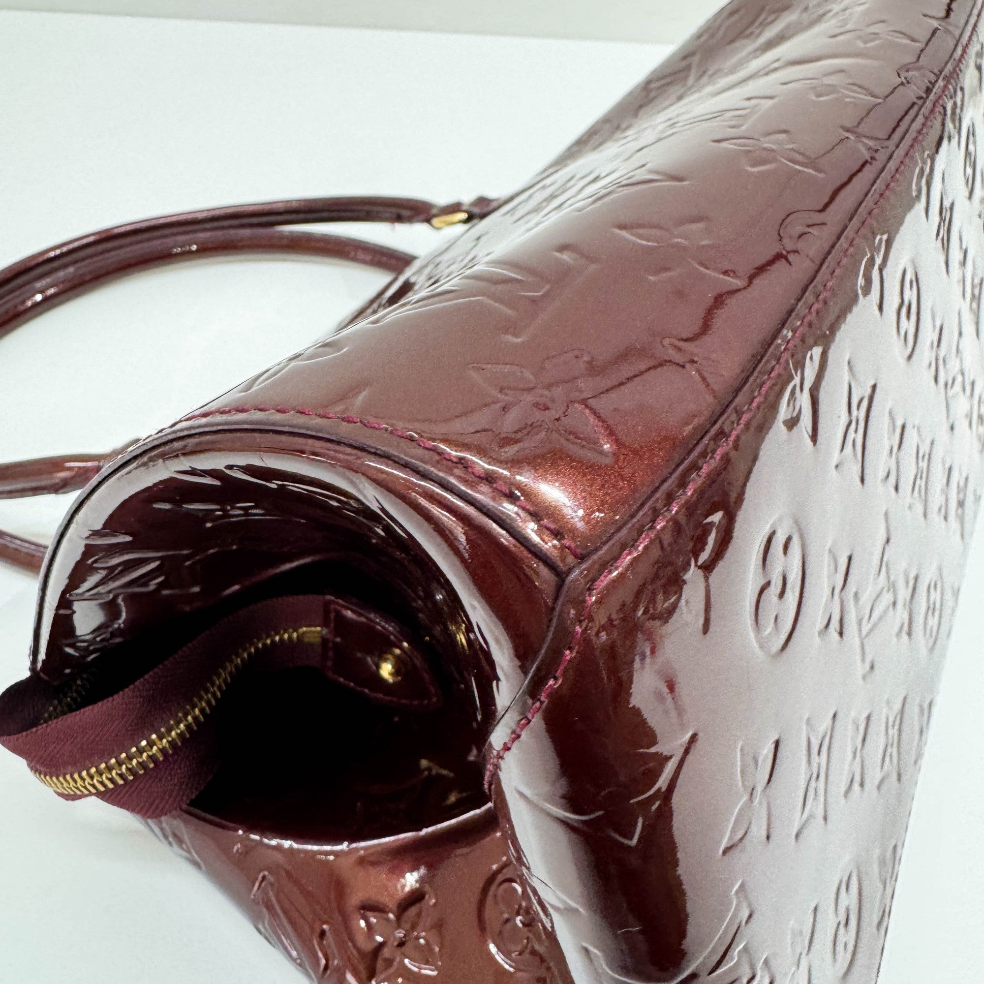Vernis Sherwood Metallic Bordeaux Monogram Leather Hand Bag