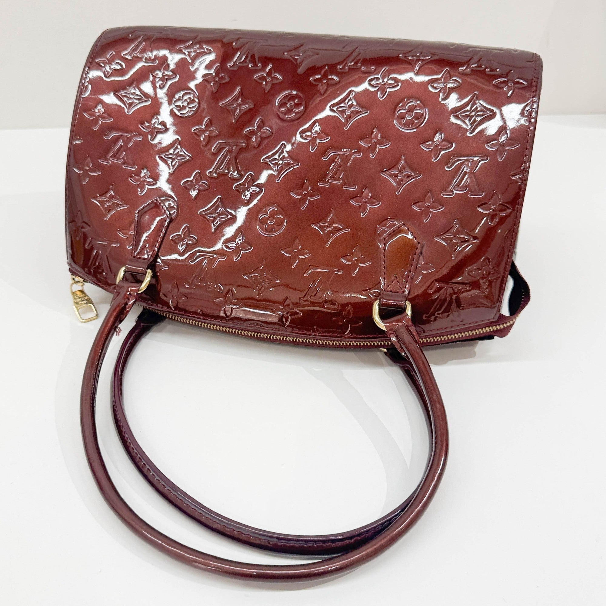 Vernis Sherwood Metallic Bordeaux Monogram Leather Hand Bag