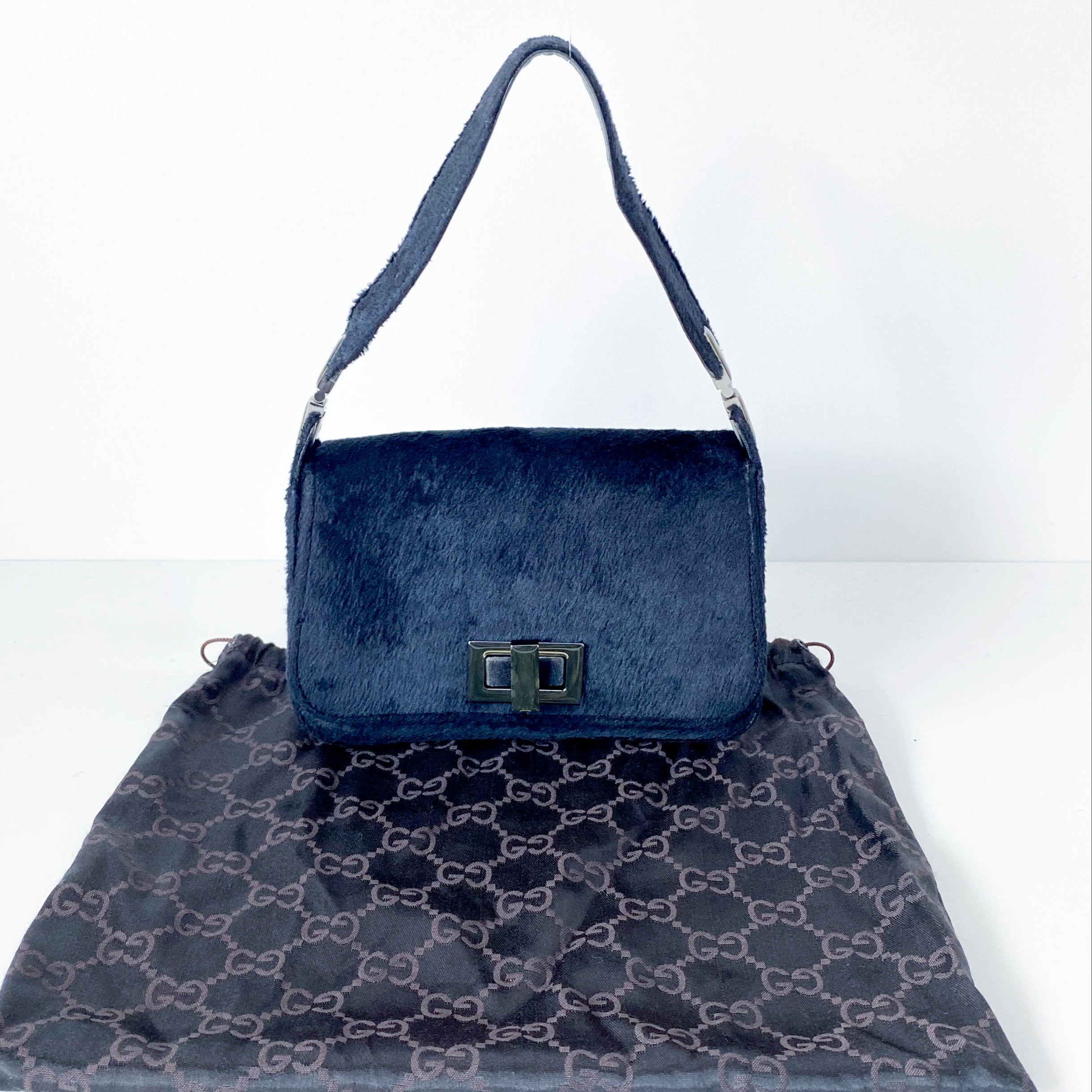 Mini Turn Lock Black Pony Hair Handle Bag