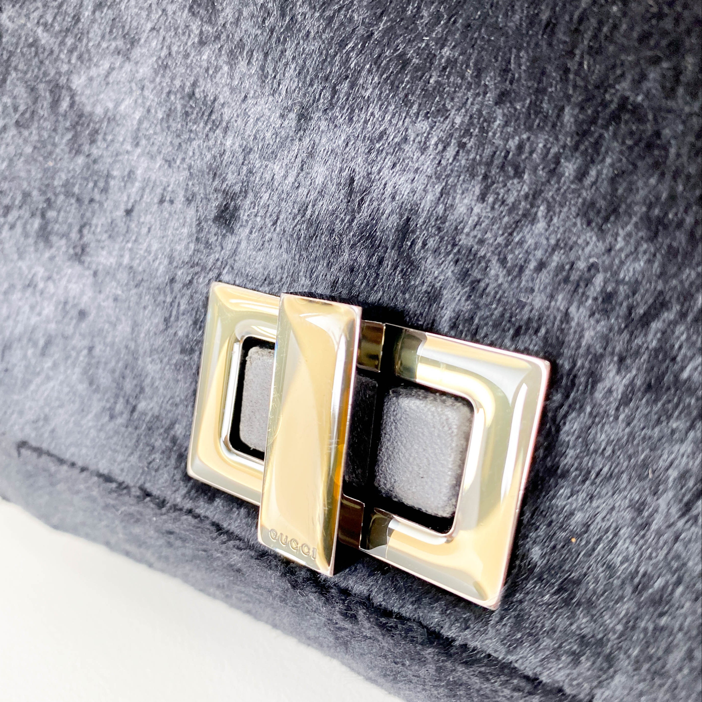 Mini Turn Lock Black Pony Hair Handle Bag