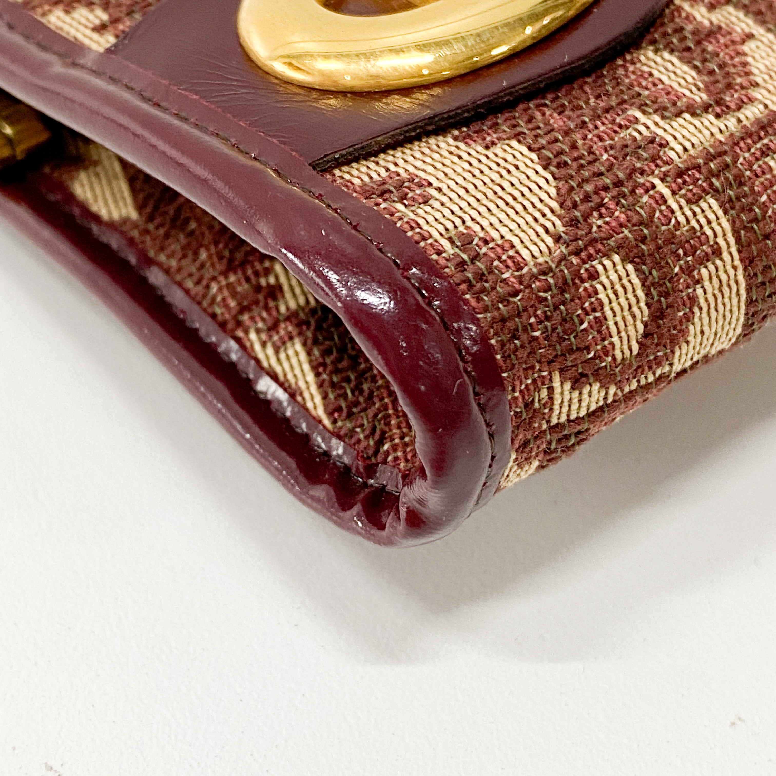 Burgundy Trotter Clutch Bag