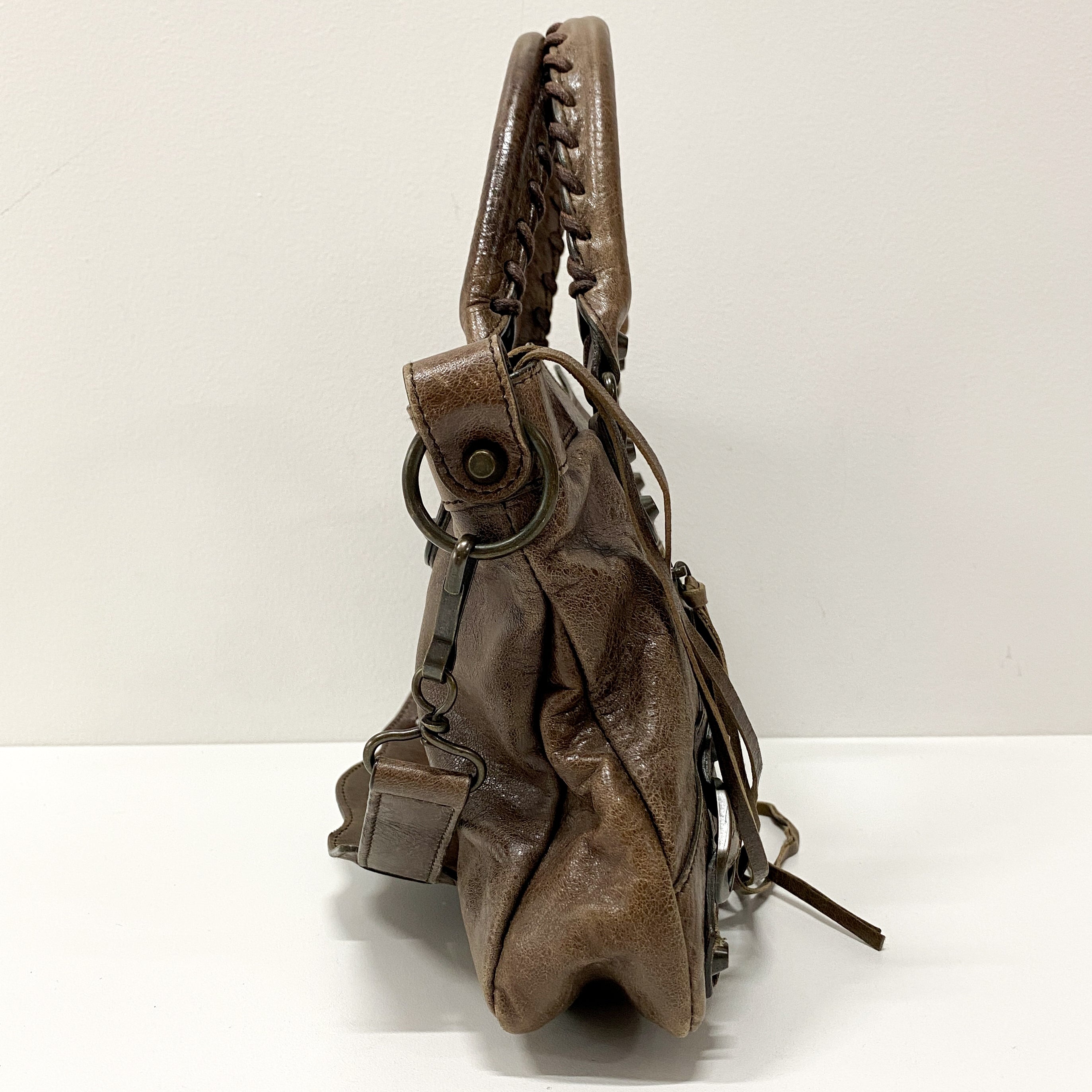 The First Brown Leather Hand Bag