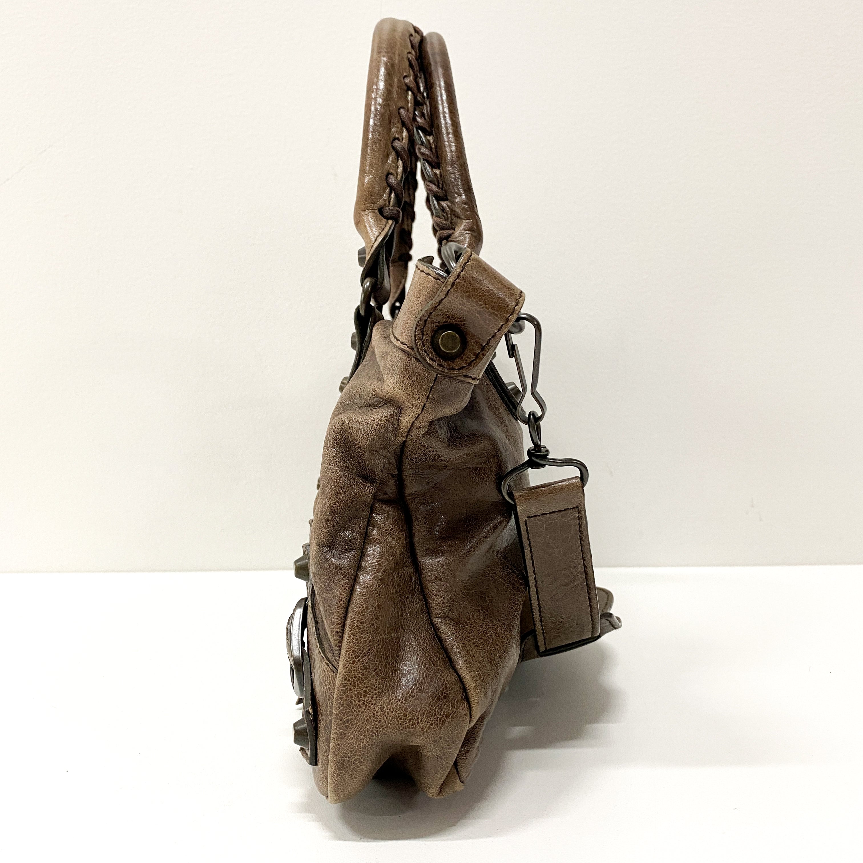 The First Brown Leather Hand Bag