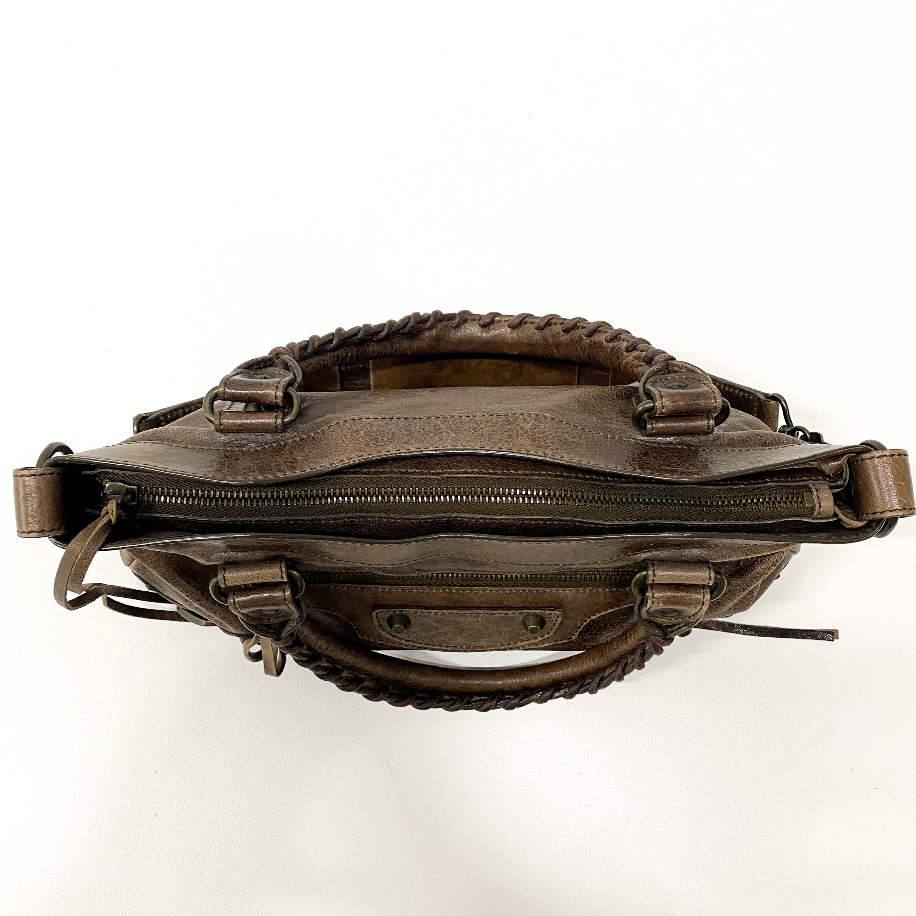 The First Brown Leather Hand Bag