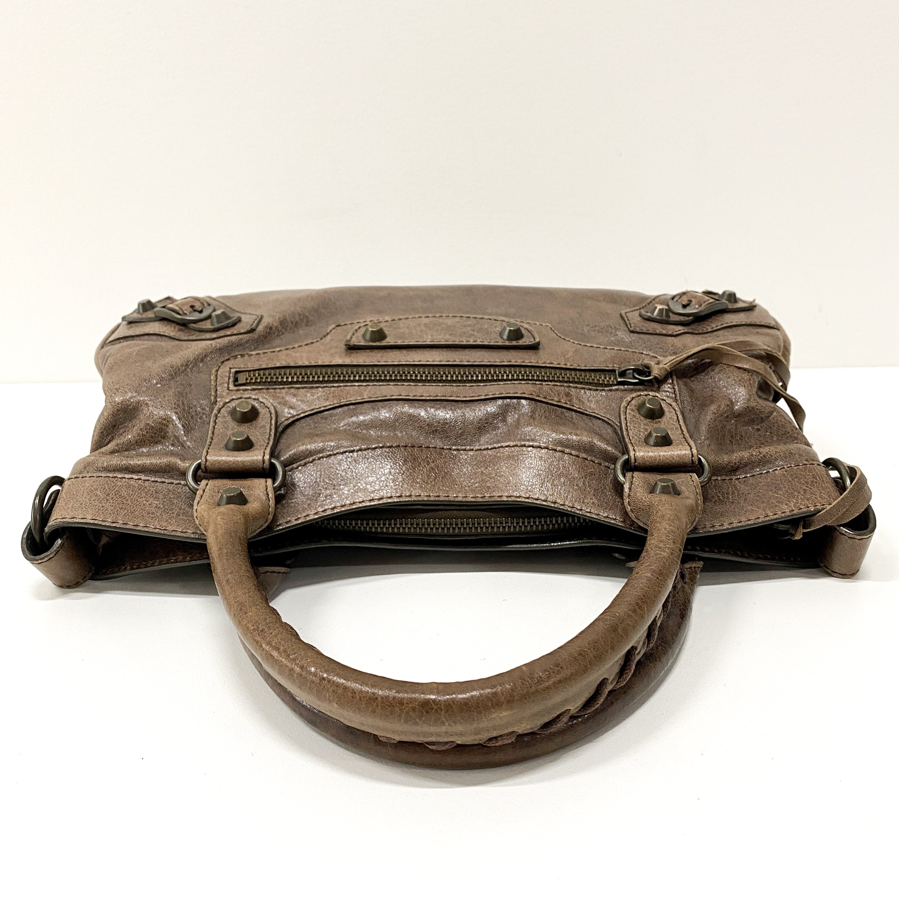 The First Brown Leather Hand Bag