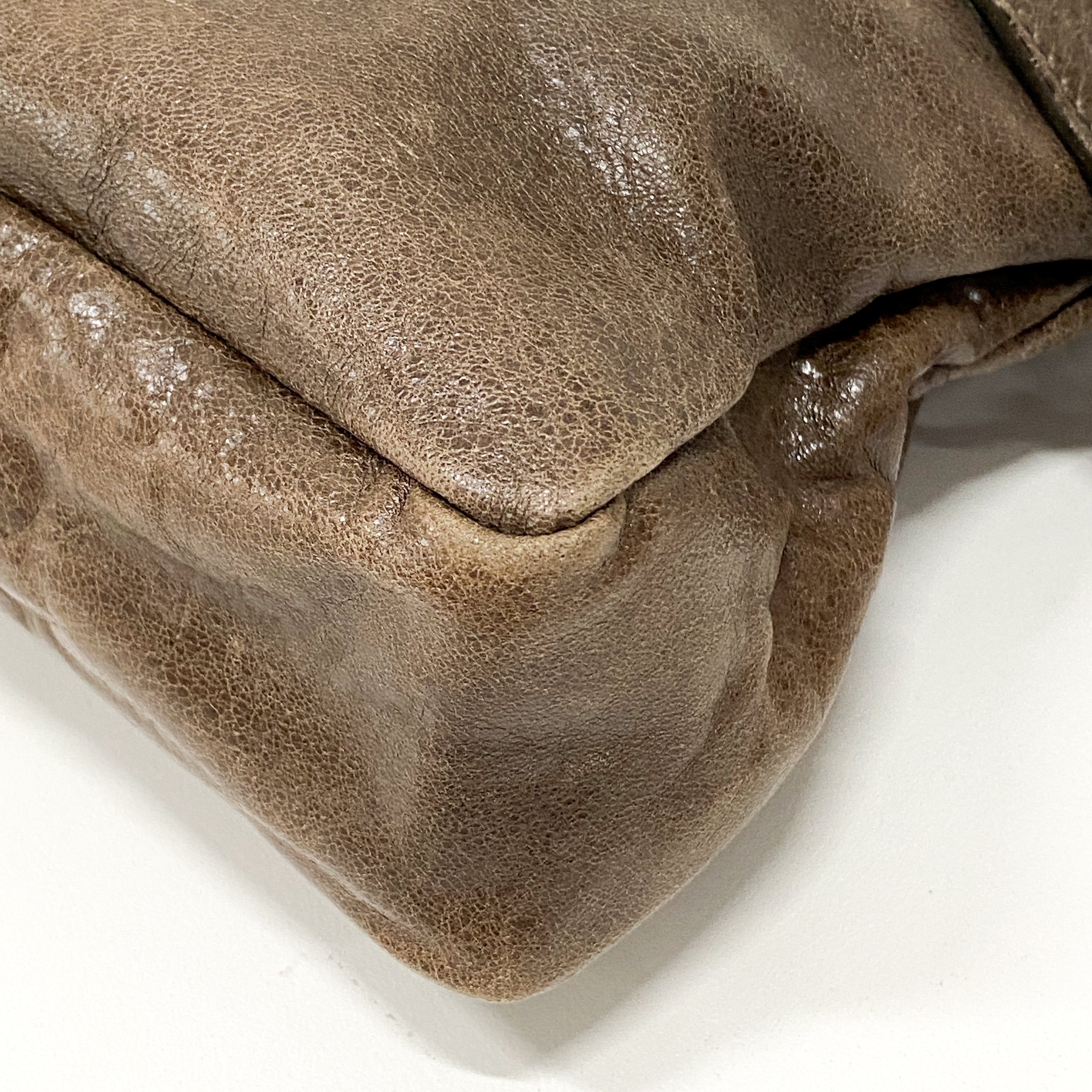 The First Brown Leather Hand Bag