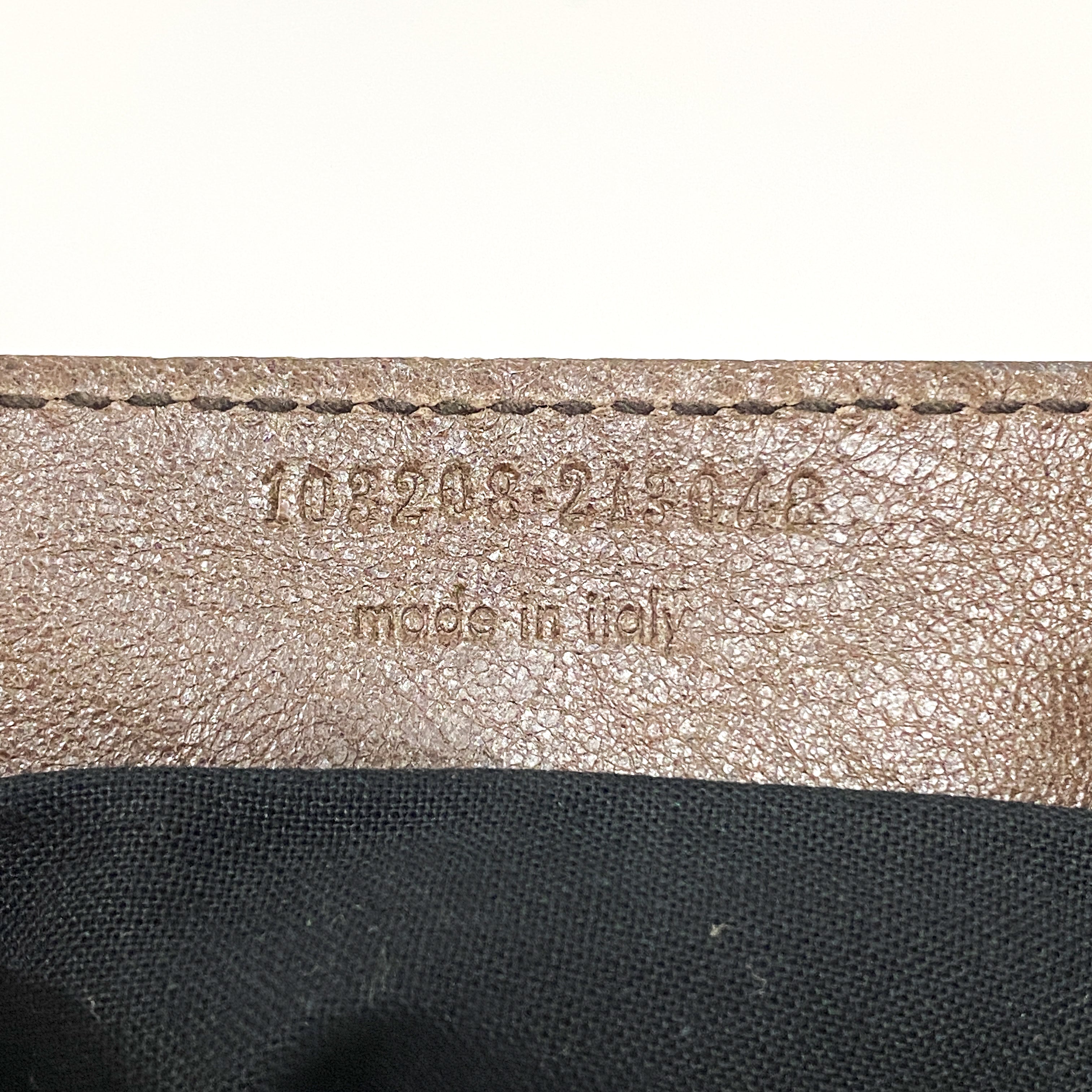 The First Brown Leather Hand Bag