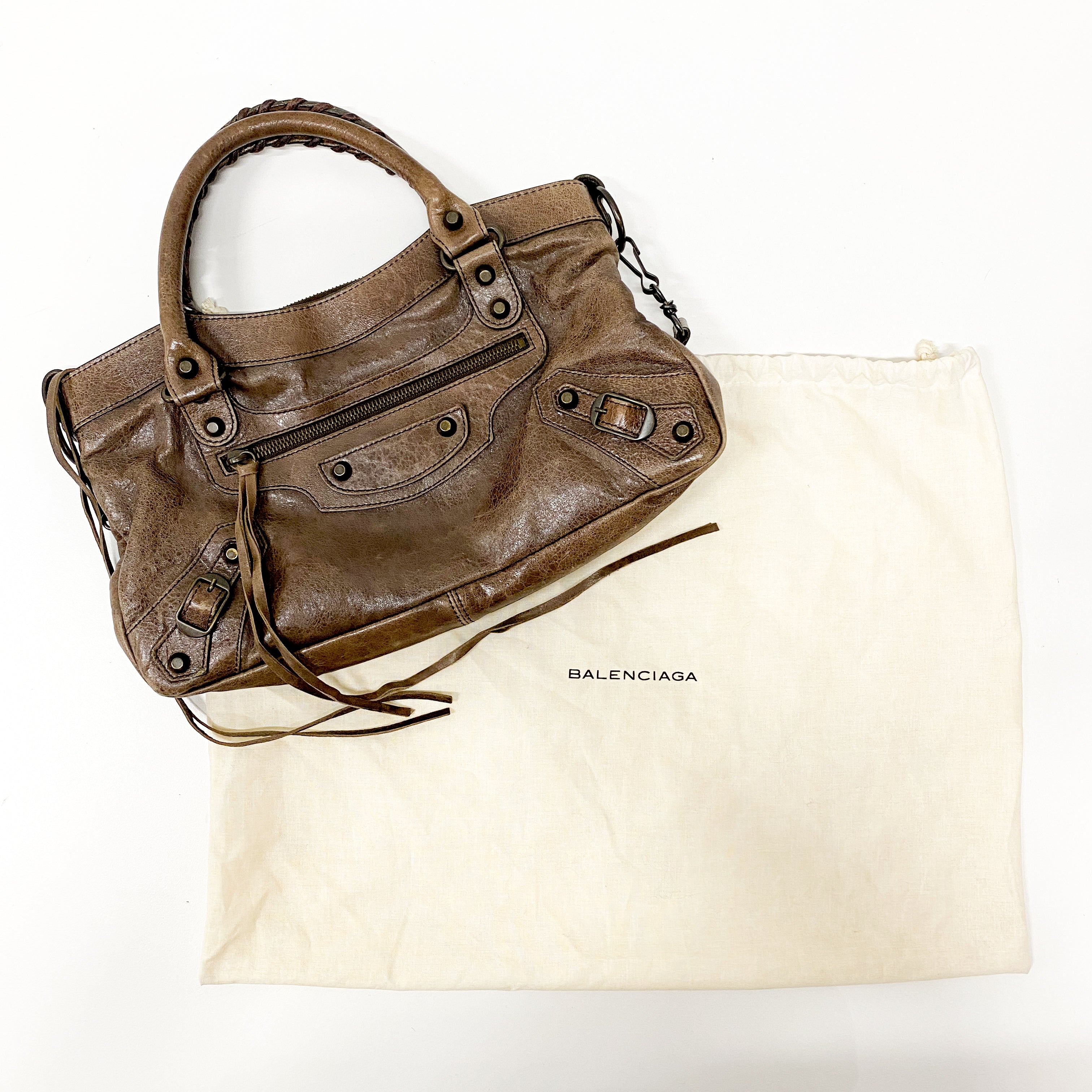 The First Brown Leather Hand Bag