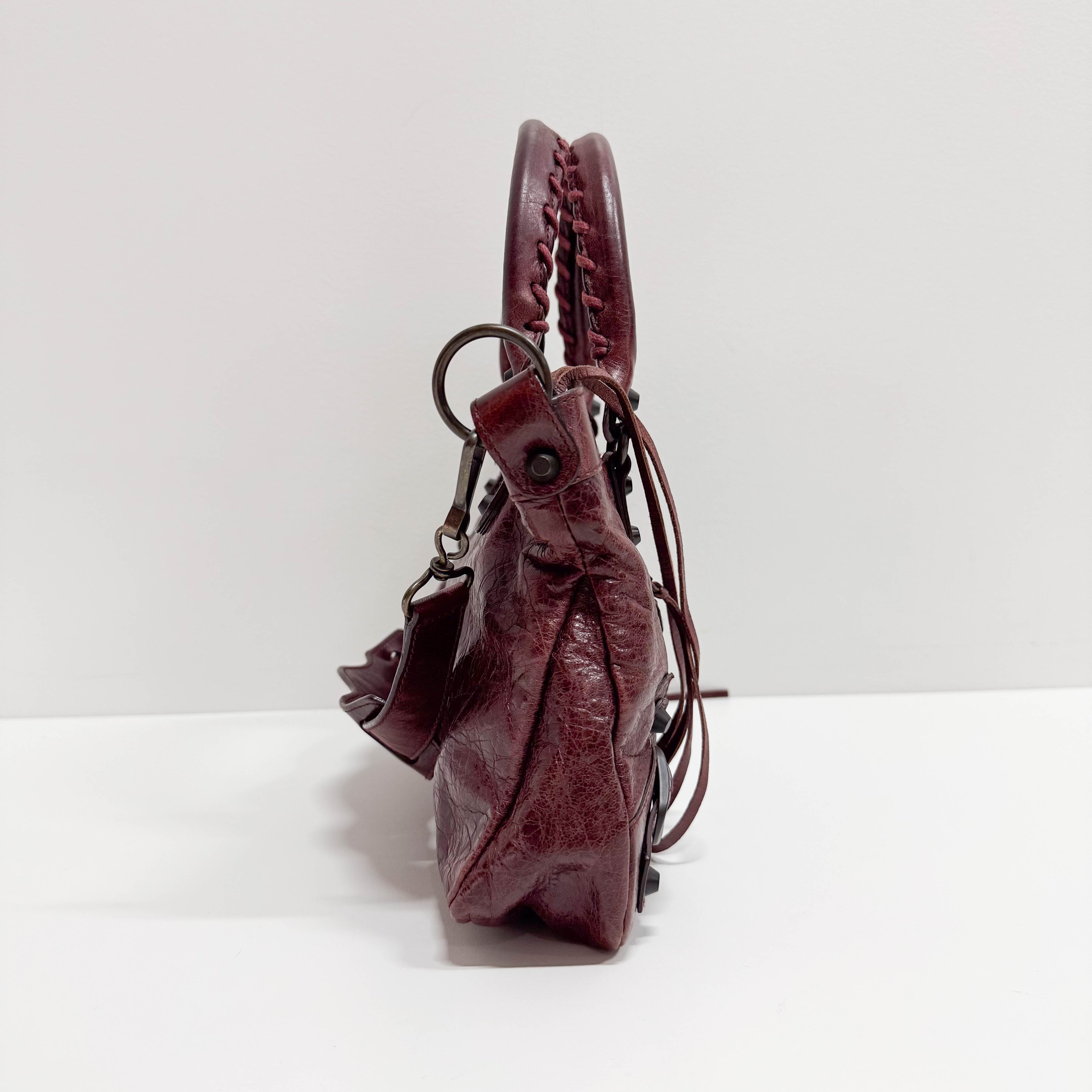 The First Burgundy Calfskin Leather Two Way Bag