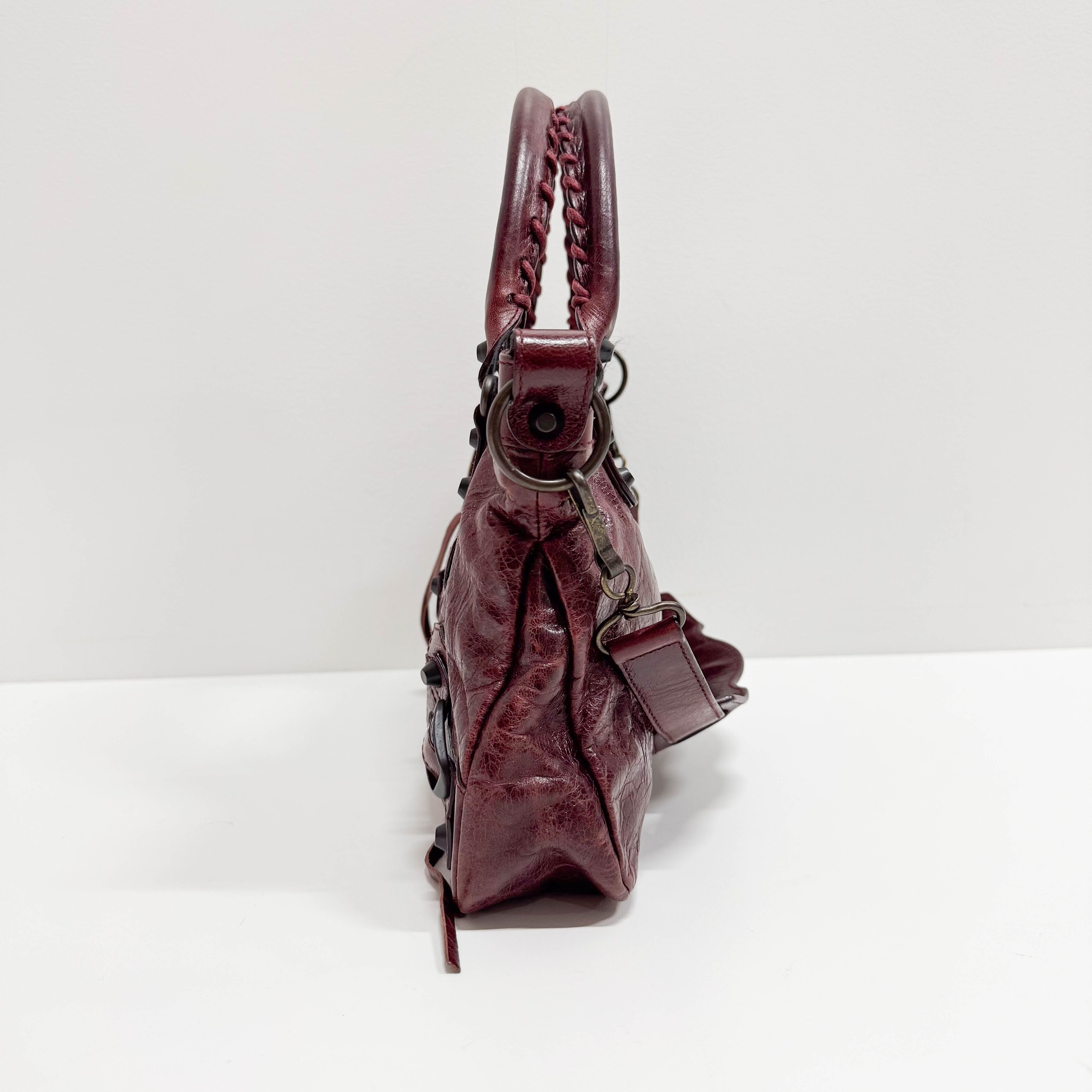 The First Burgundy Calfskin Leather Two Way Bag