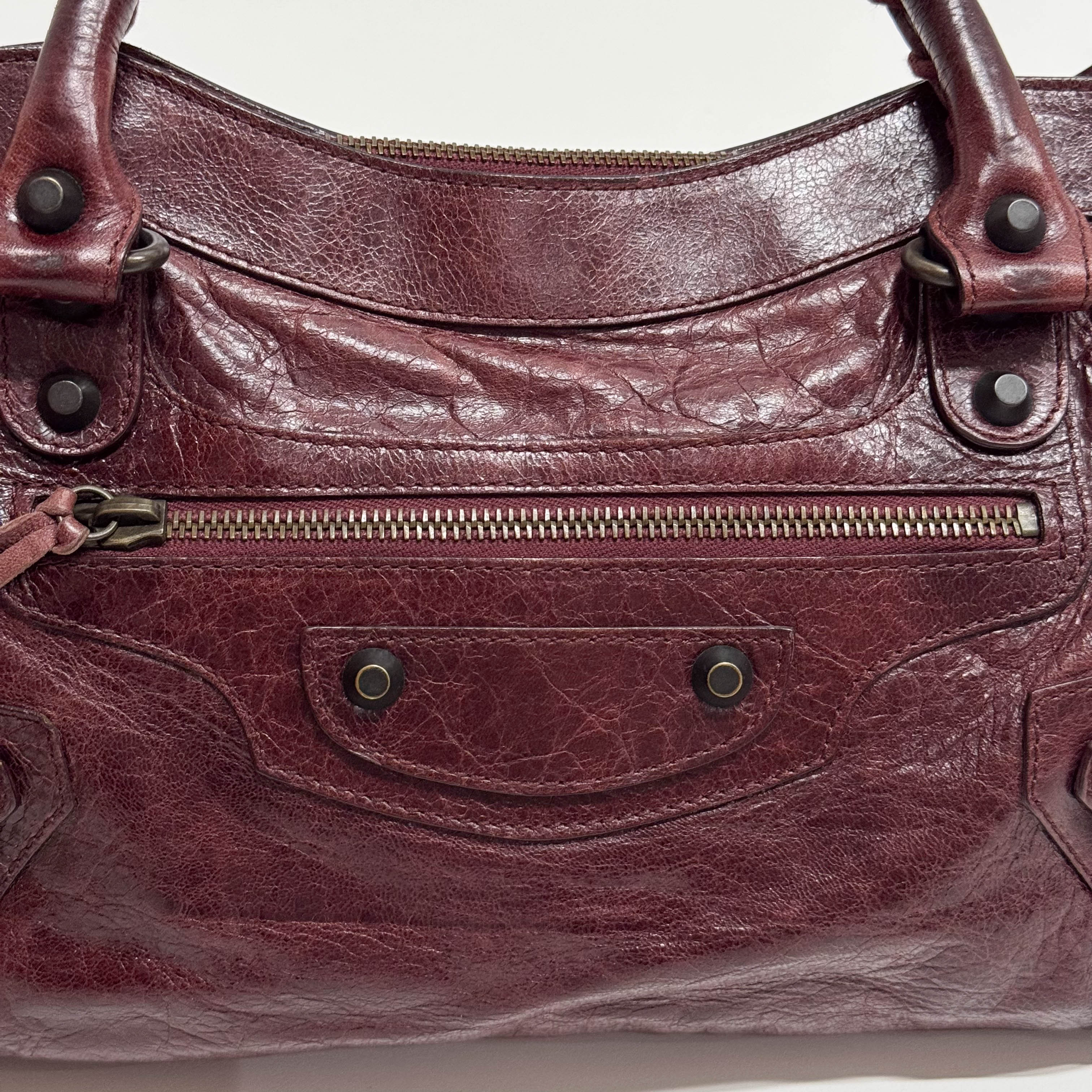 The First Burgundy Calfskin Leather Two Way Bag