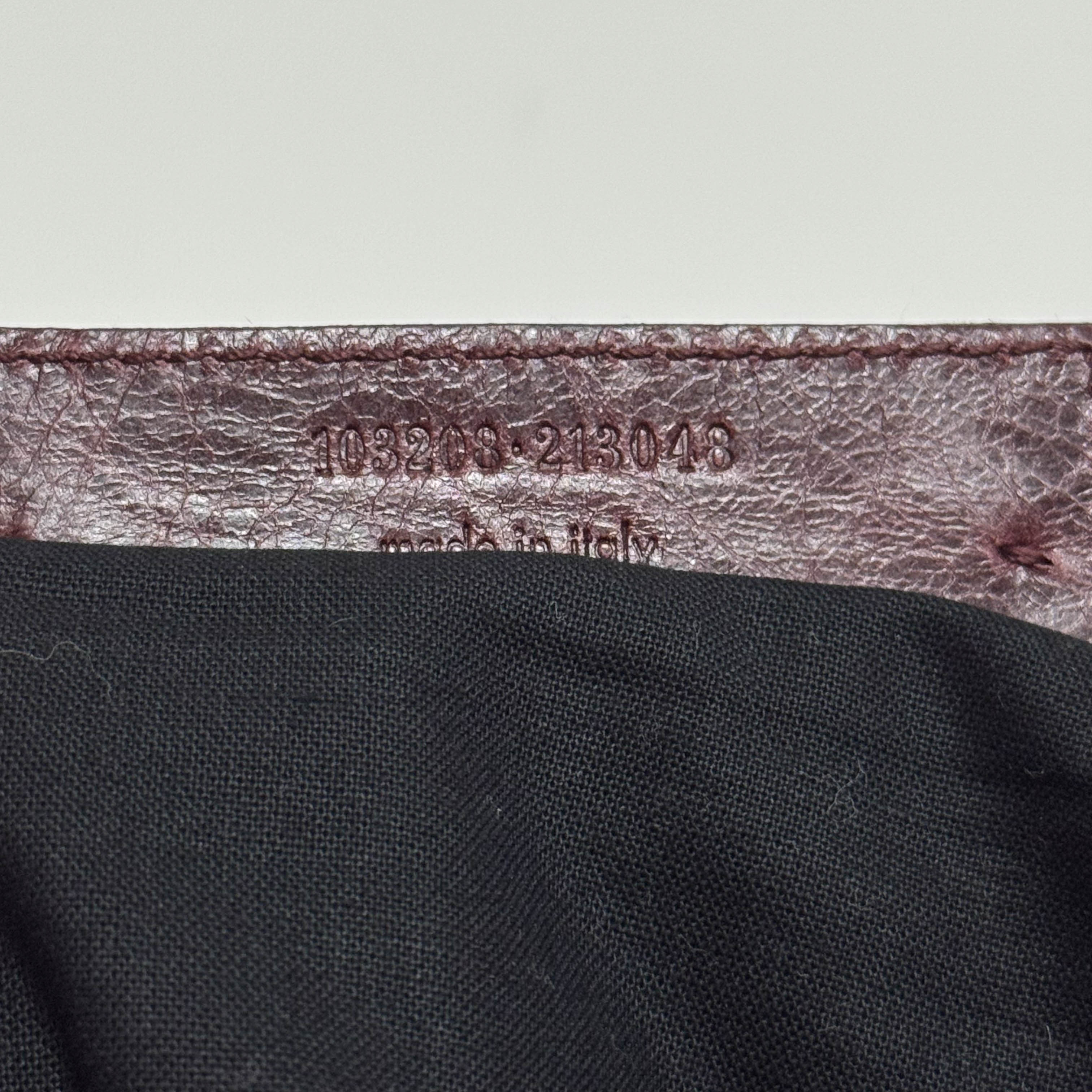 The First Burgundy Calfskin Leather Two Way Bag