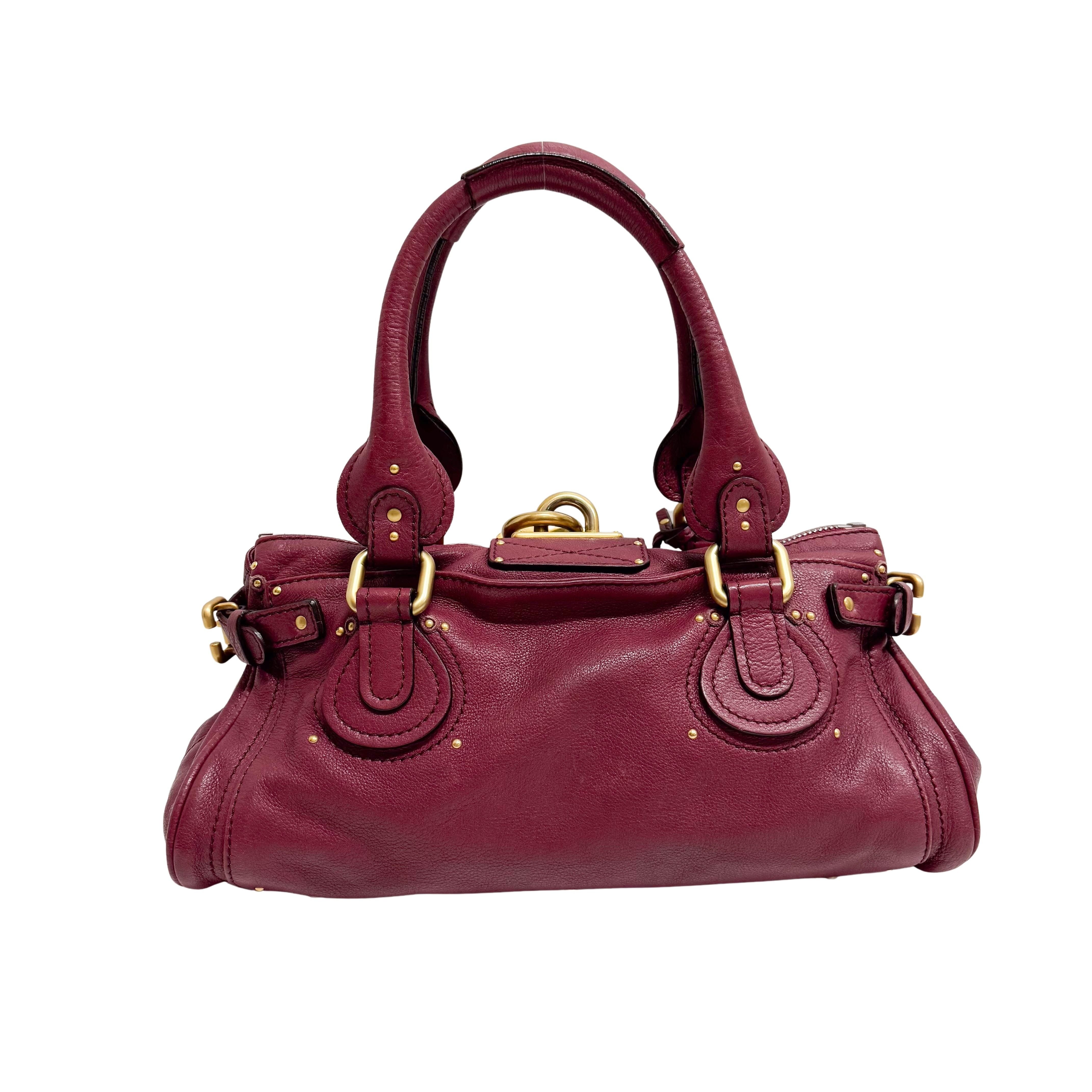 The First Burgundy Calfskin Leather Two Way Bag