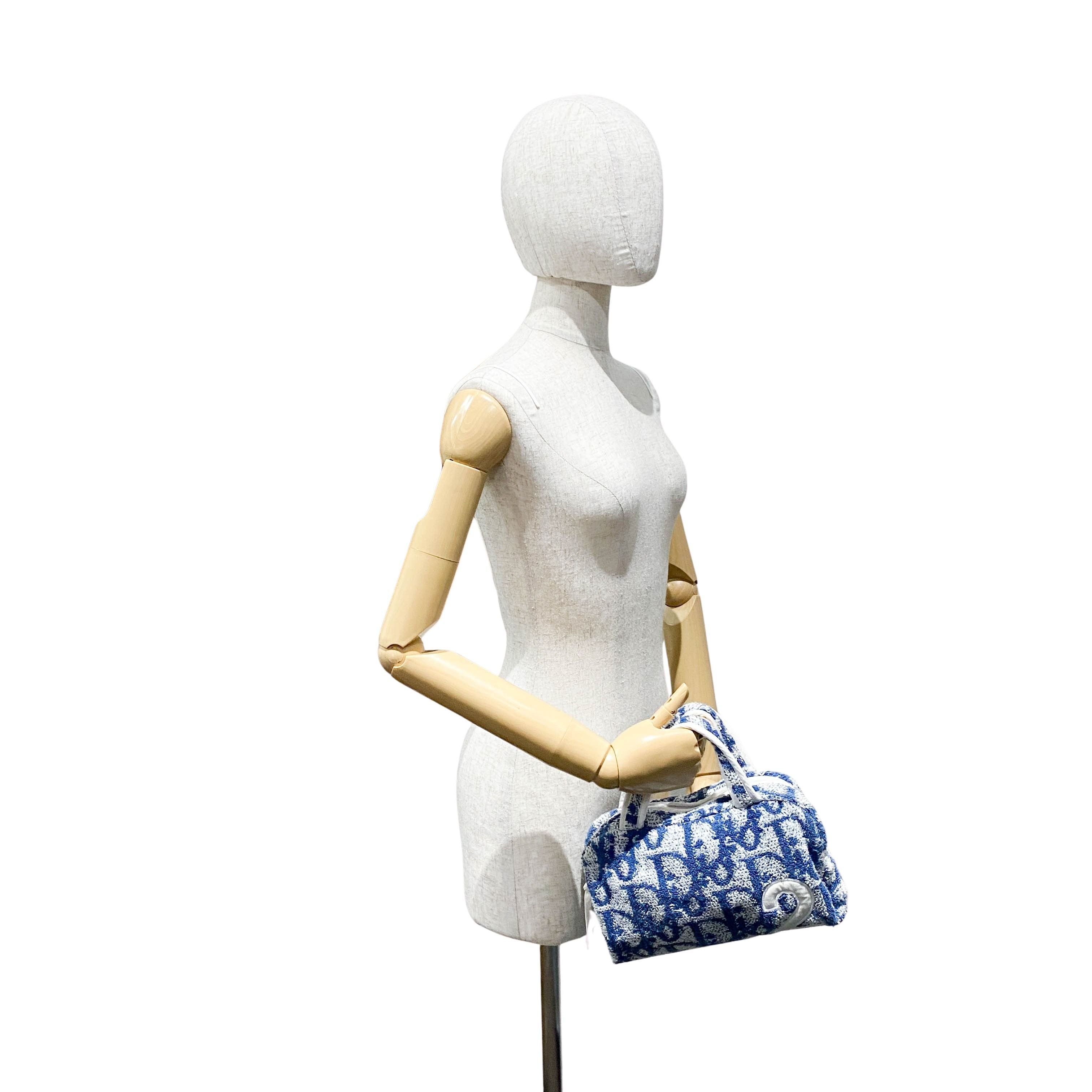 Trotter Mini Blue Monogram Terrycloth Handbag