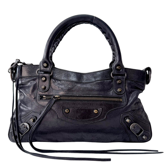 The First Black Leather Bag