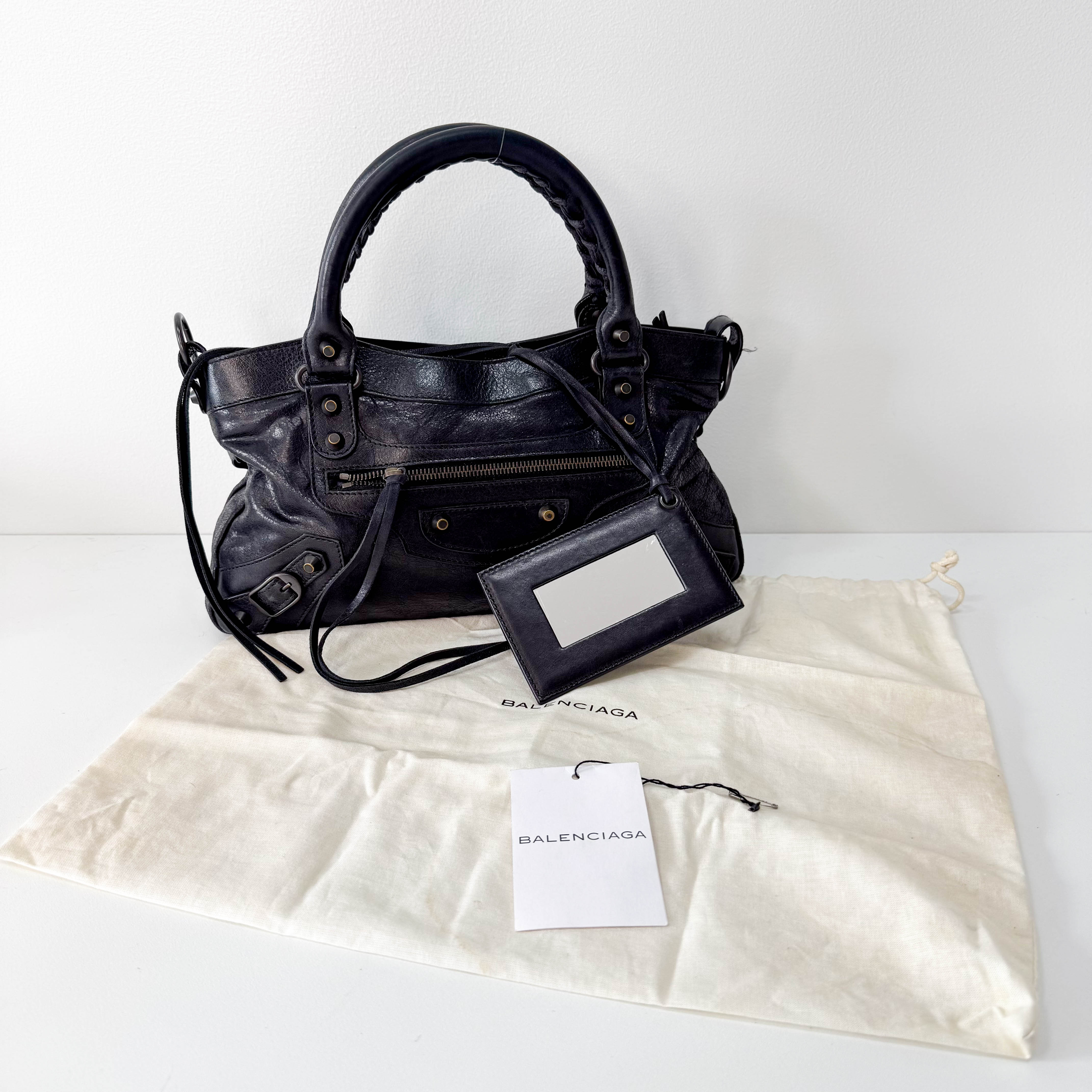 The First Black Leather Bag