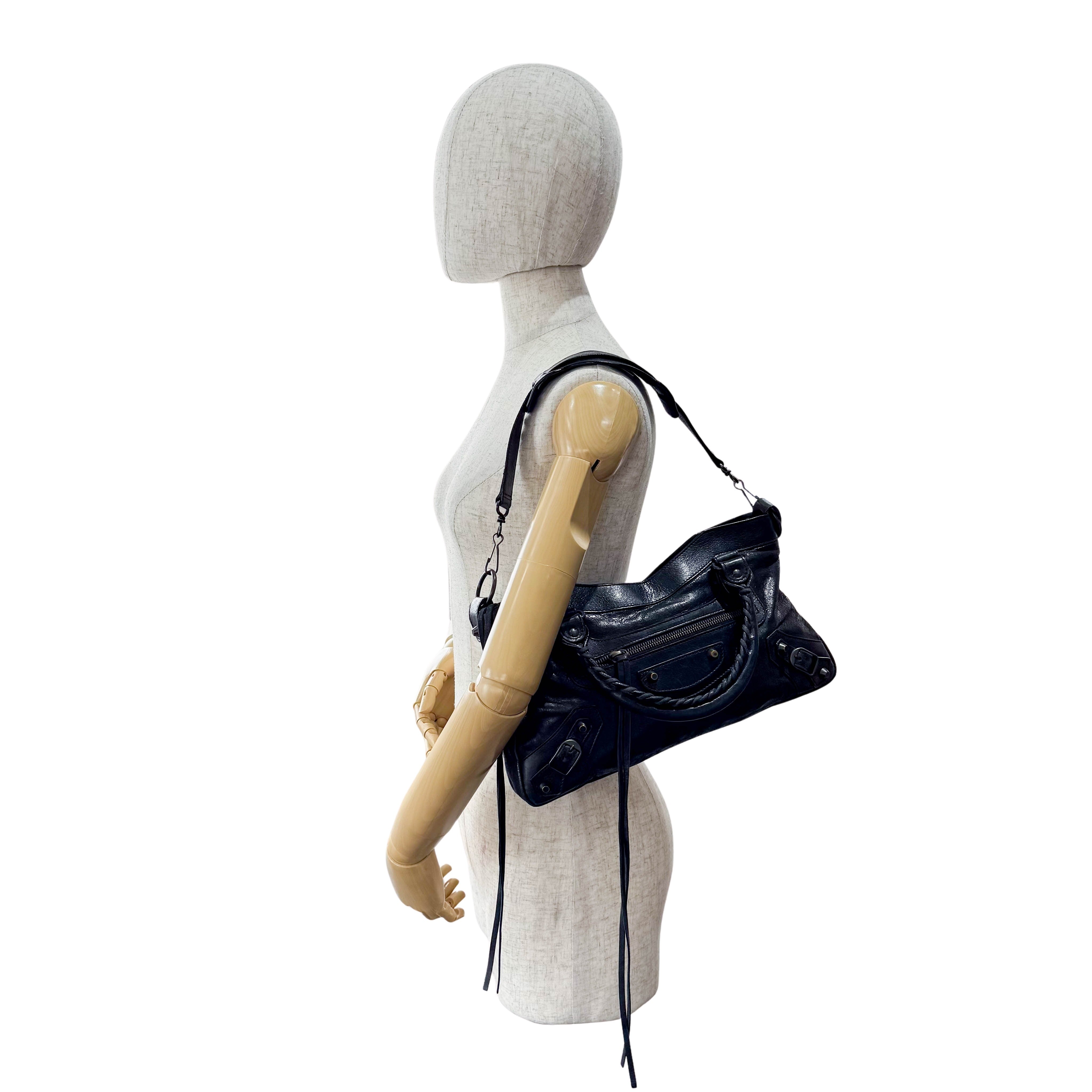 The First Black Leather Bag