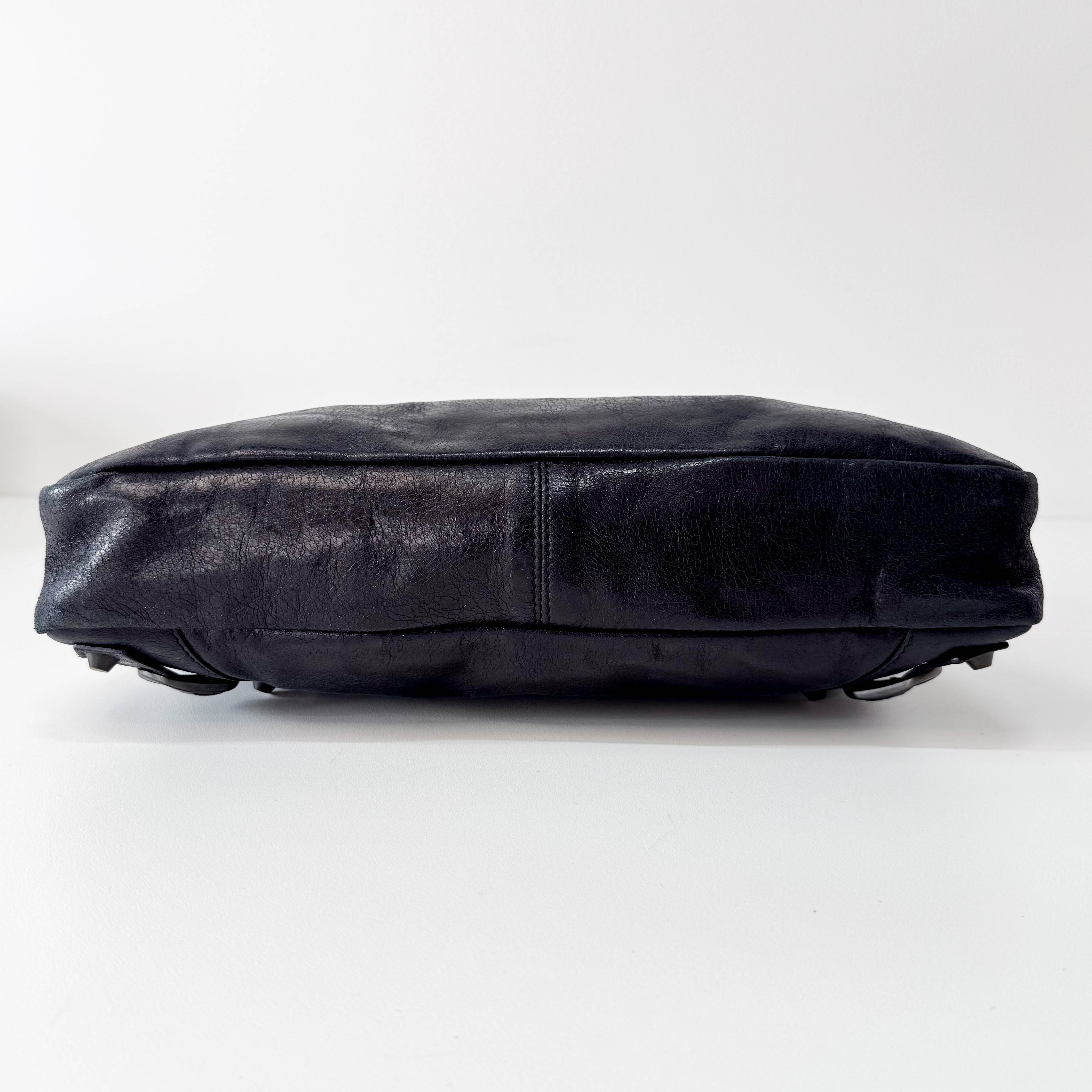 The First Black Leather Bag