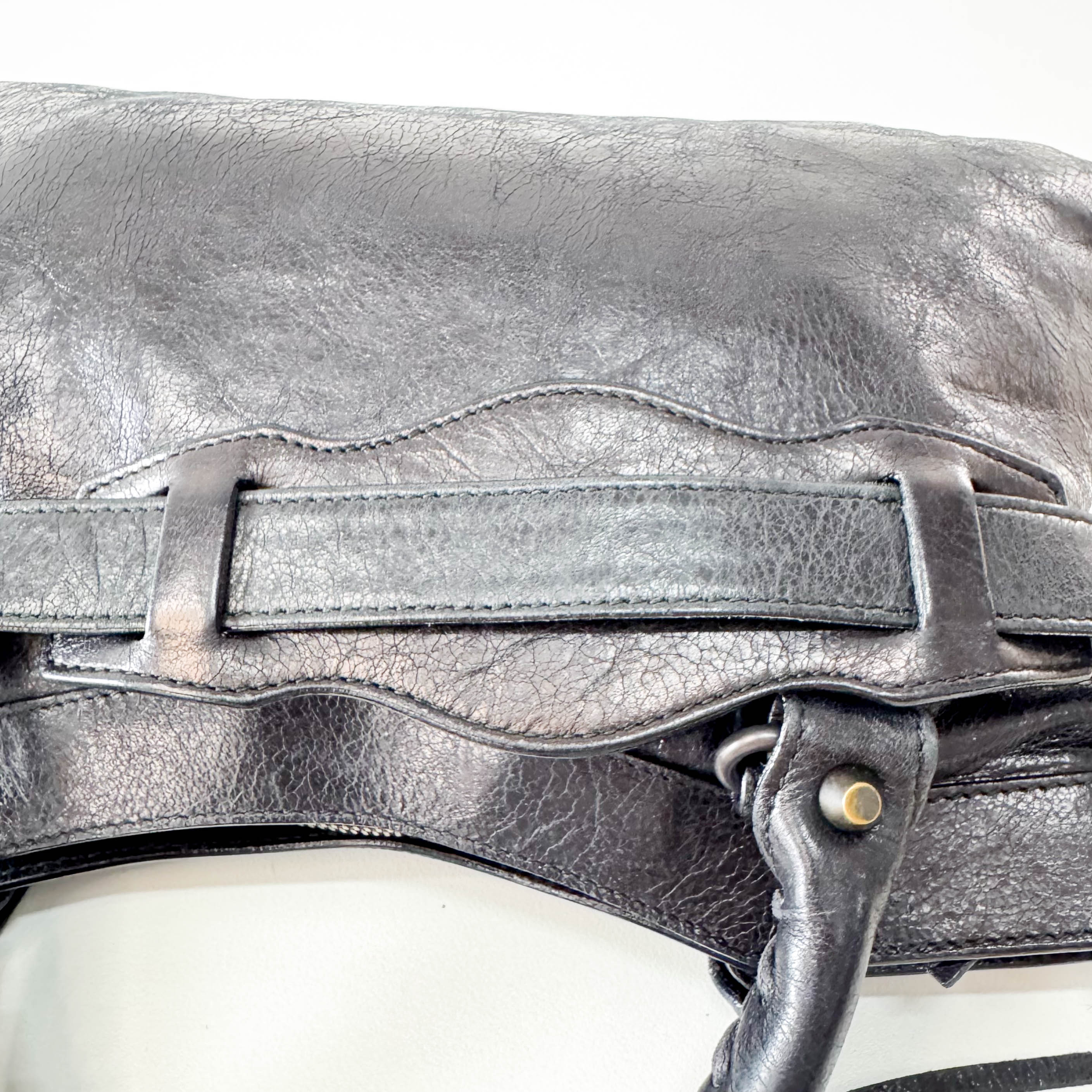 The First Black Leather Bag