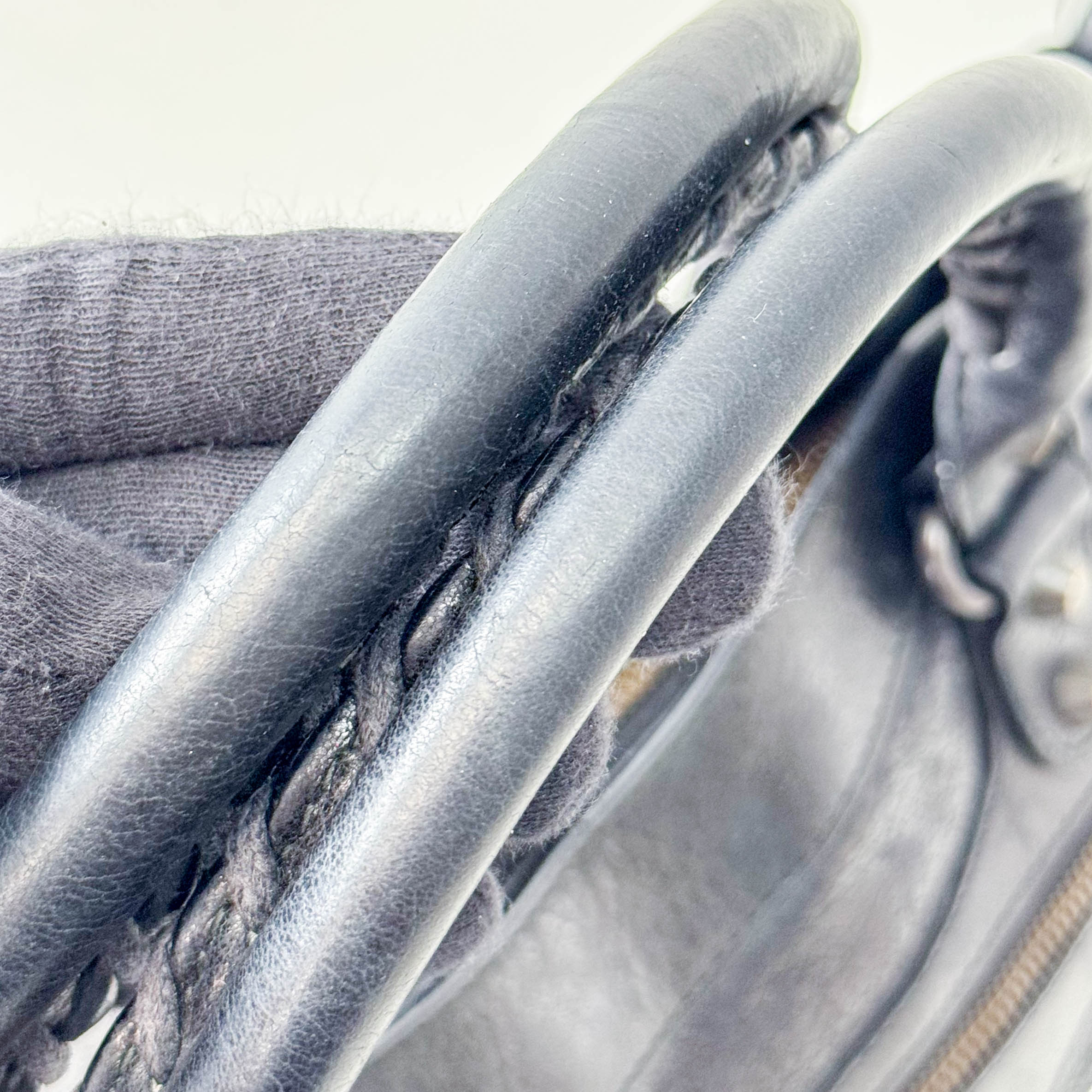 The First Black Leather Bag