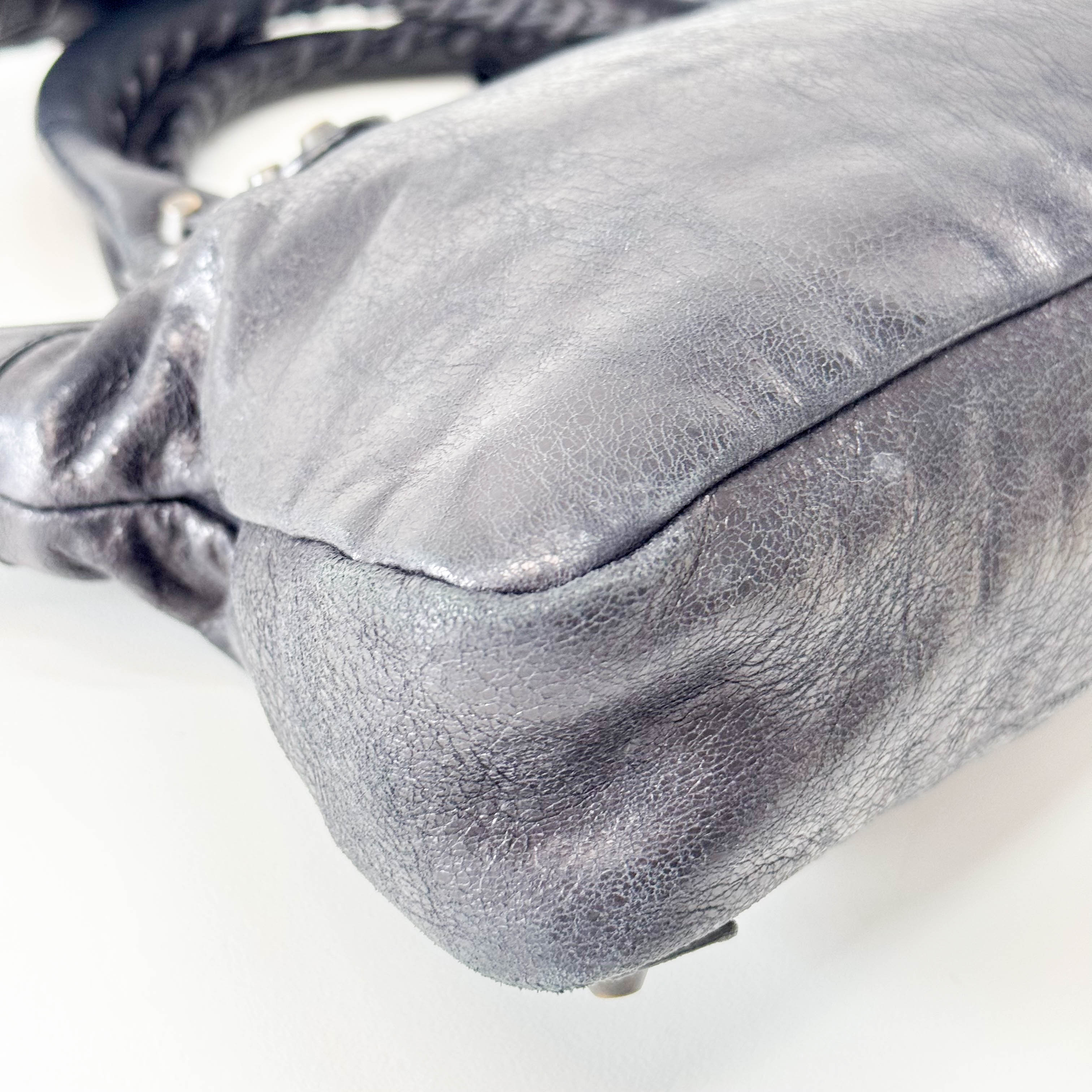 The First Black Leather Bag