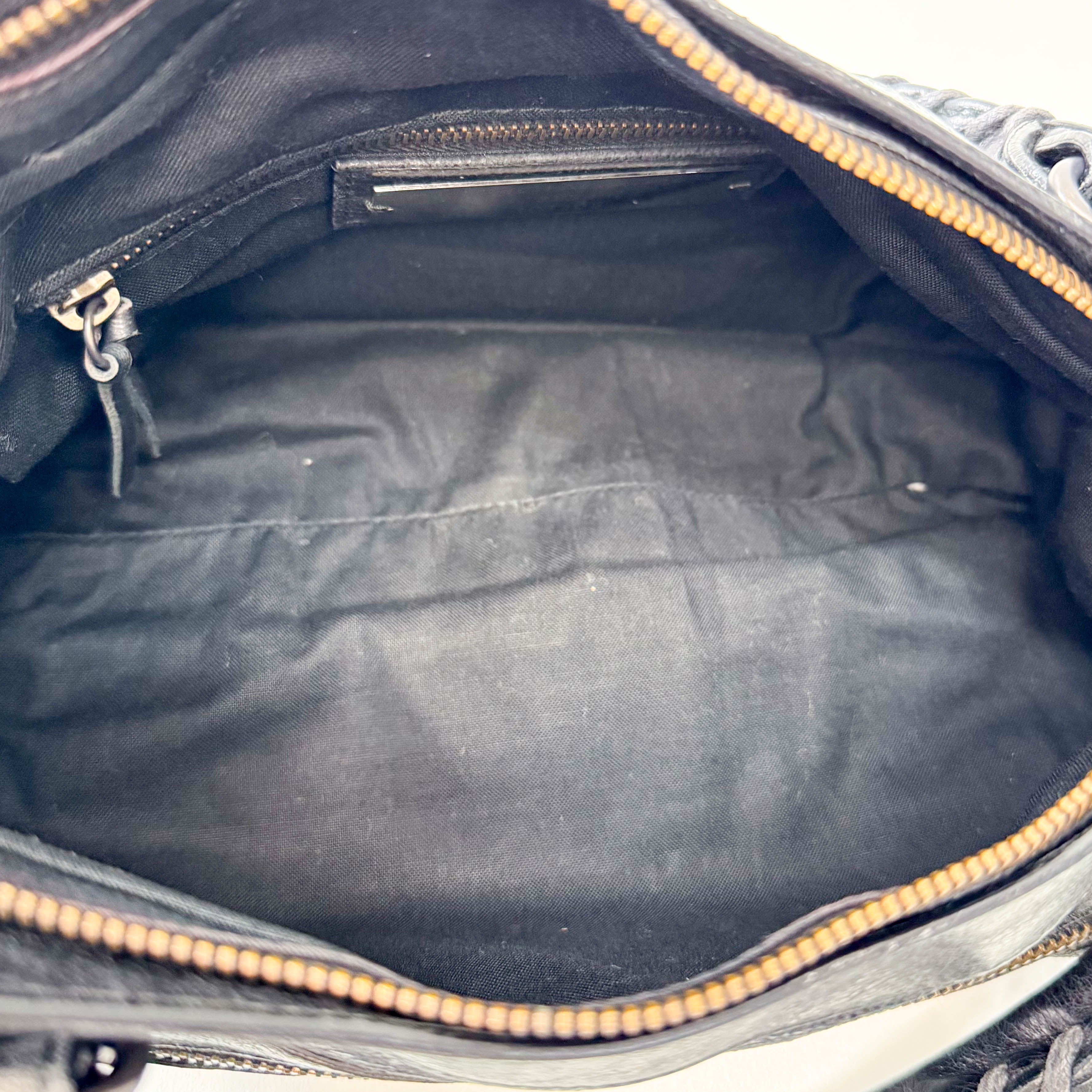 The First Black Leather Bag