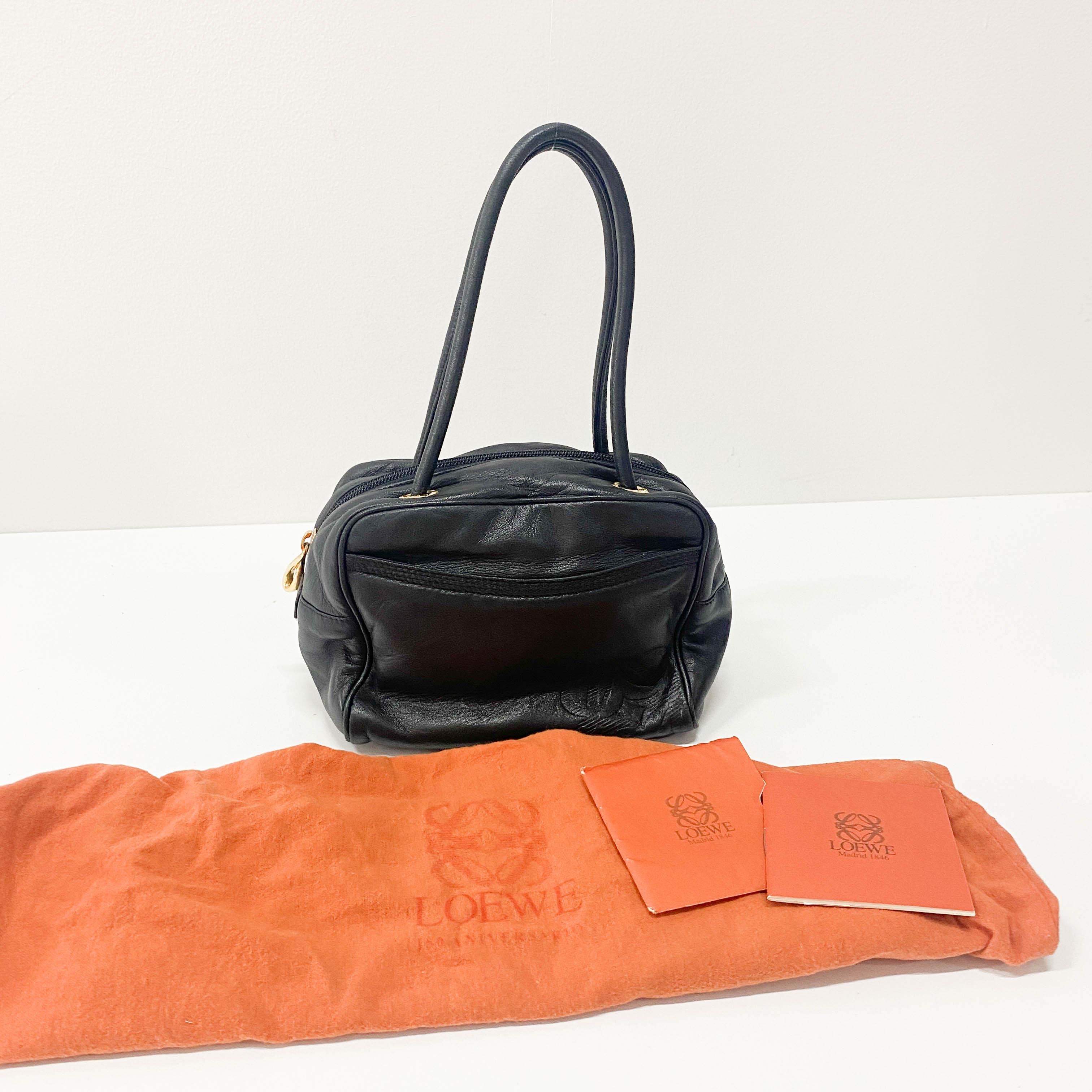 Anagram Small Black Leather Handbag