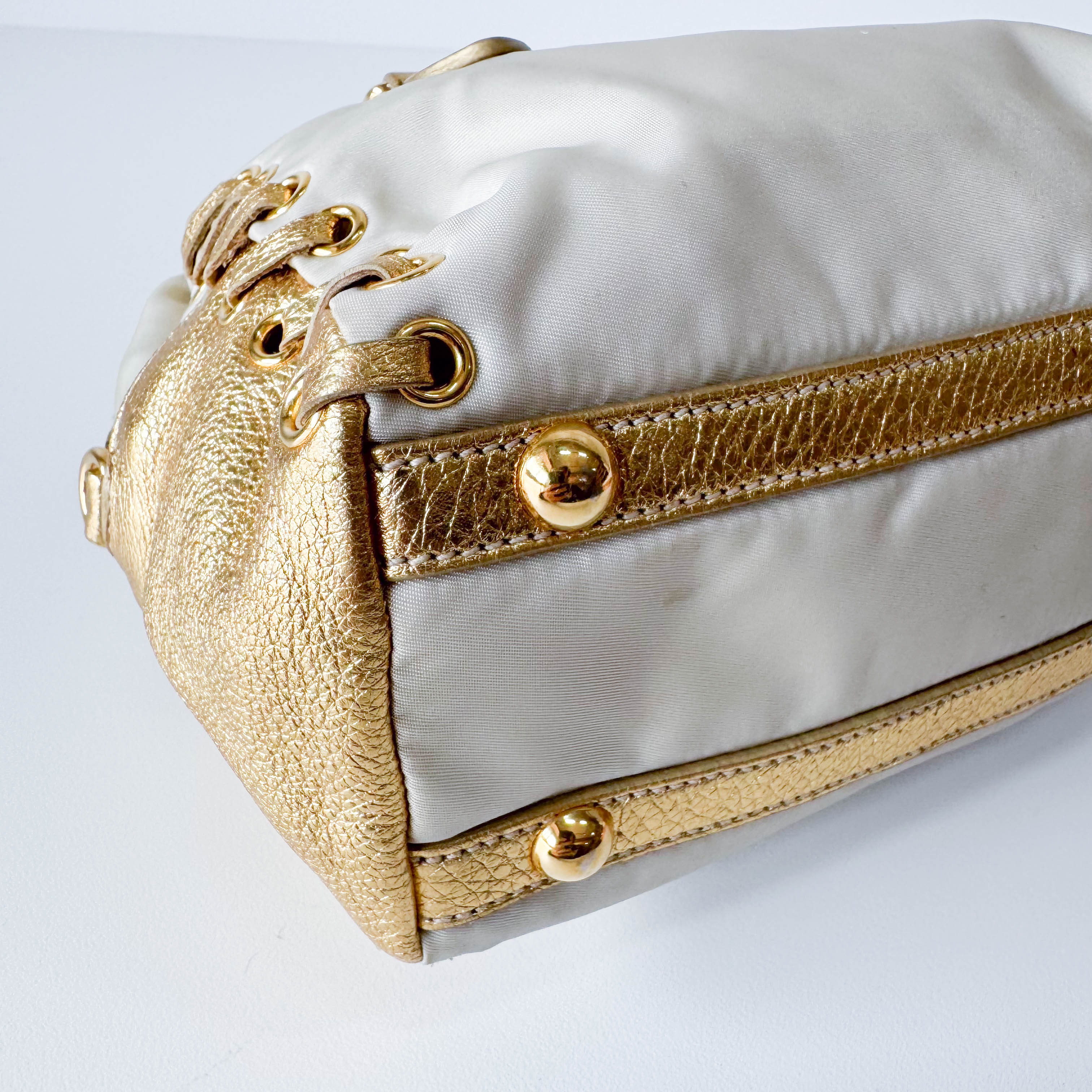Bow Gold Leather and Nylon Hand Bag