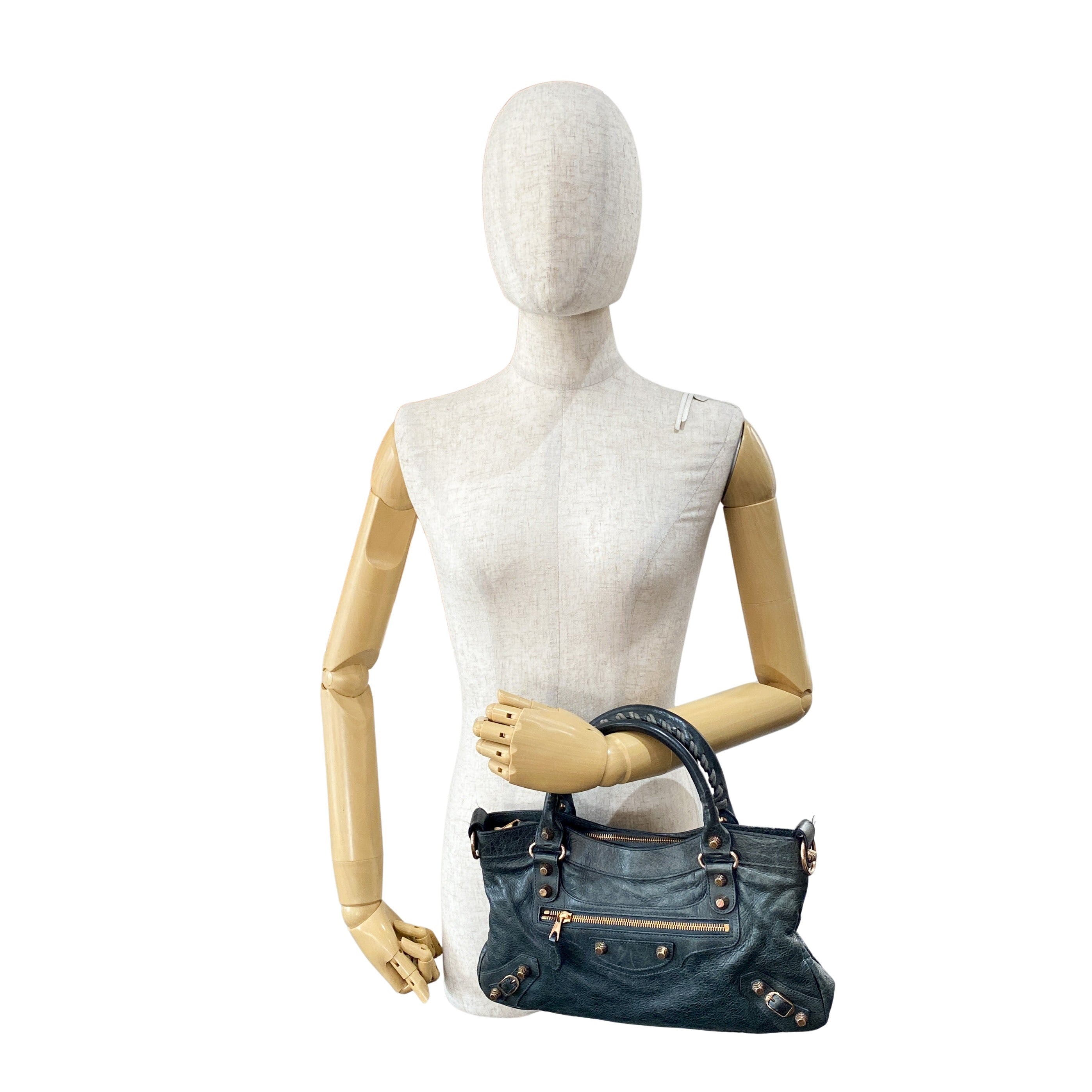 The First Grey Leather Bag