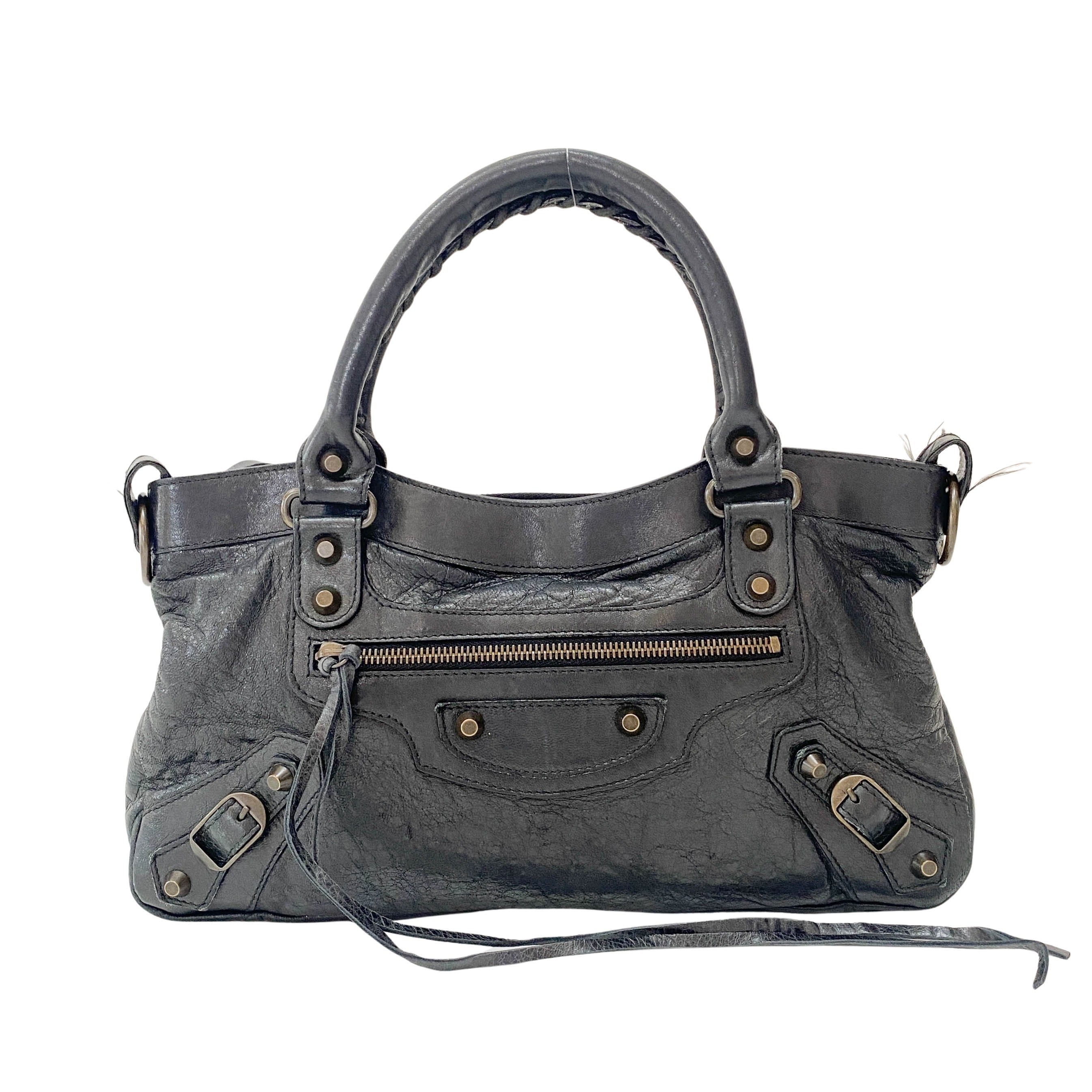 The First Black Leather Handlebag