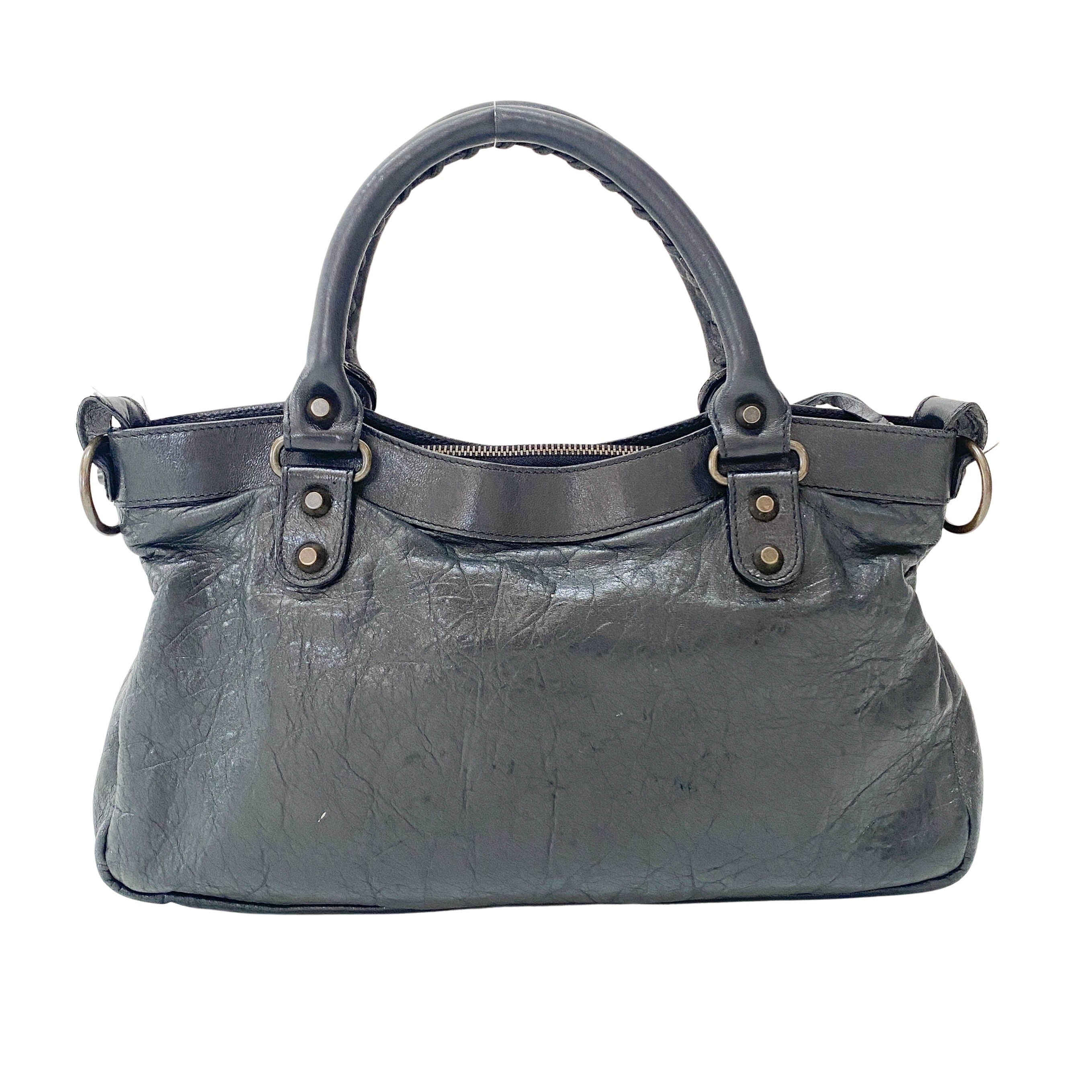 The First Black Leather Handlebag