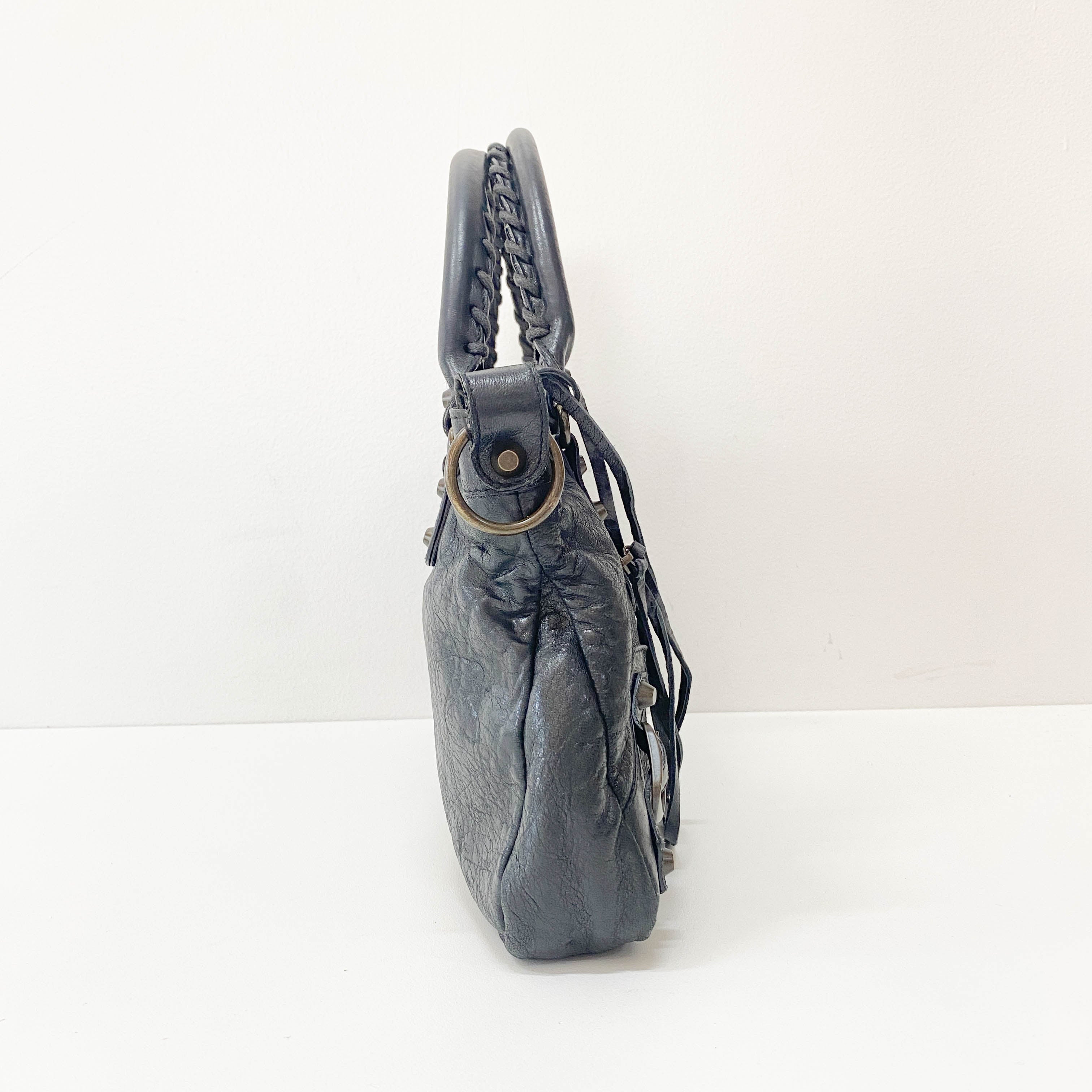 The First Black Leather Handlebag