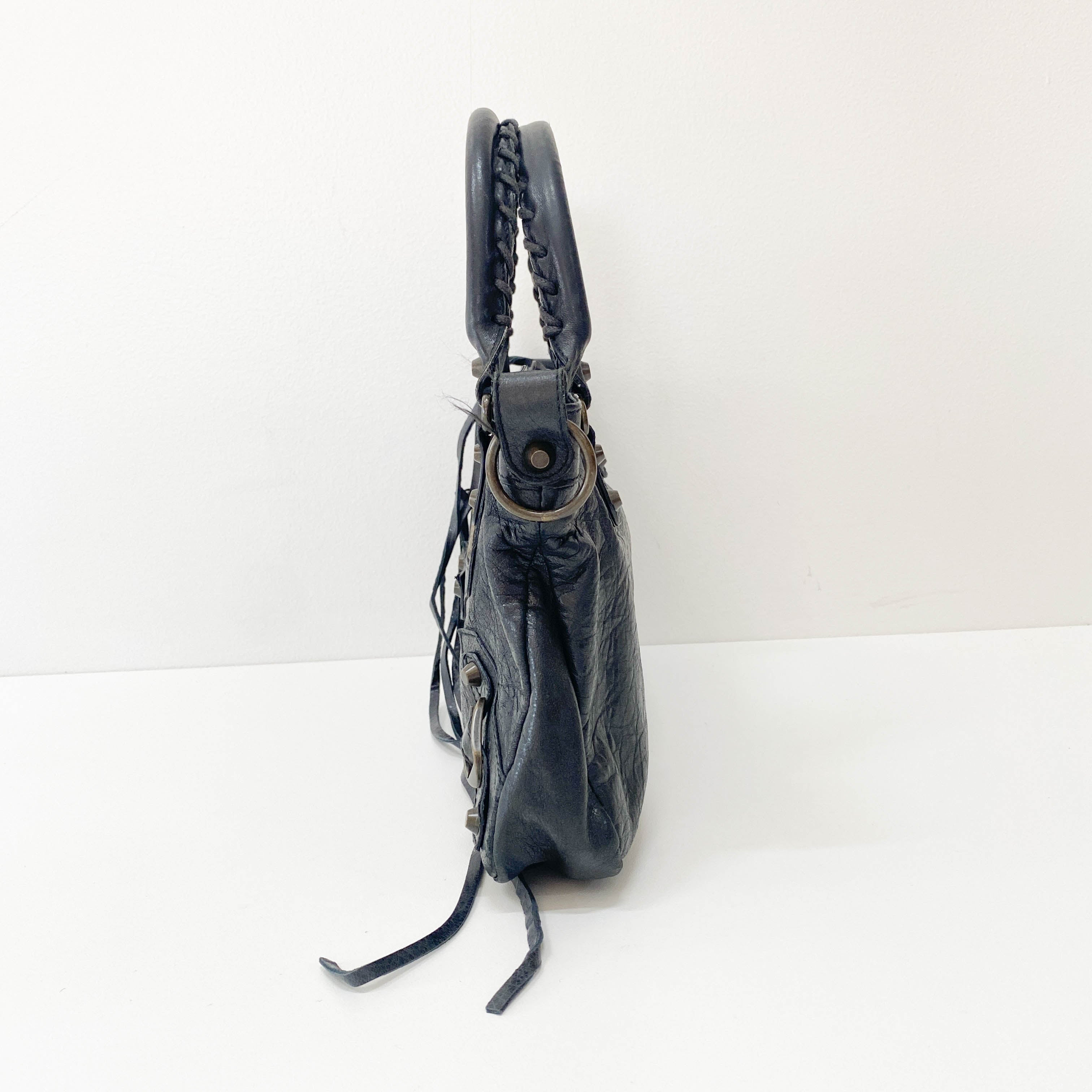 The First Black Leather Handlebag