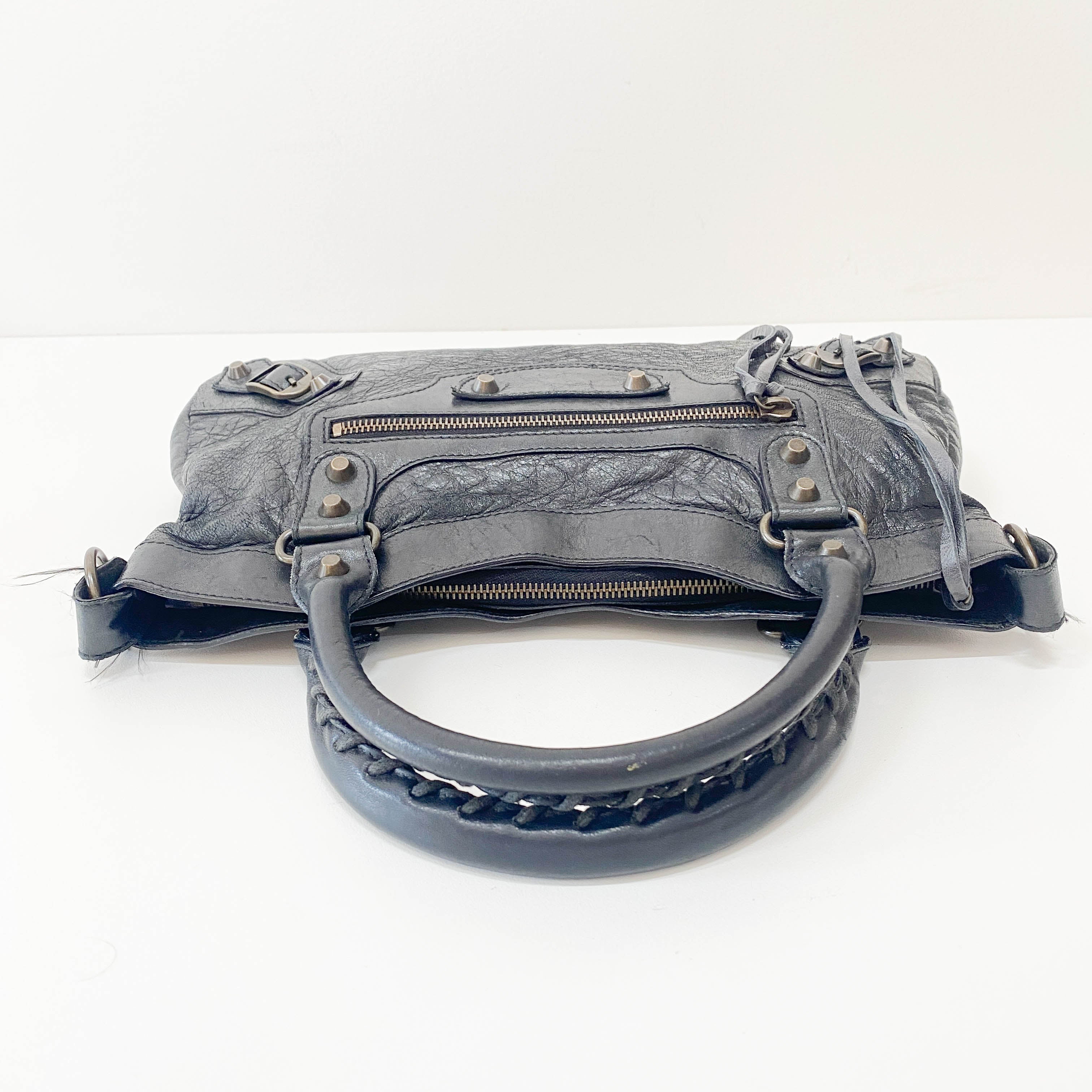 The First Black Leather Handlebag