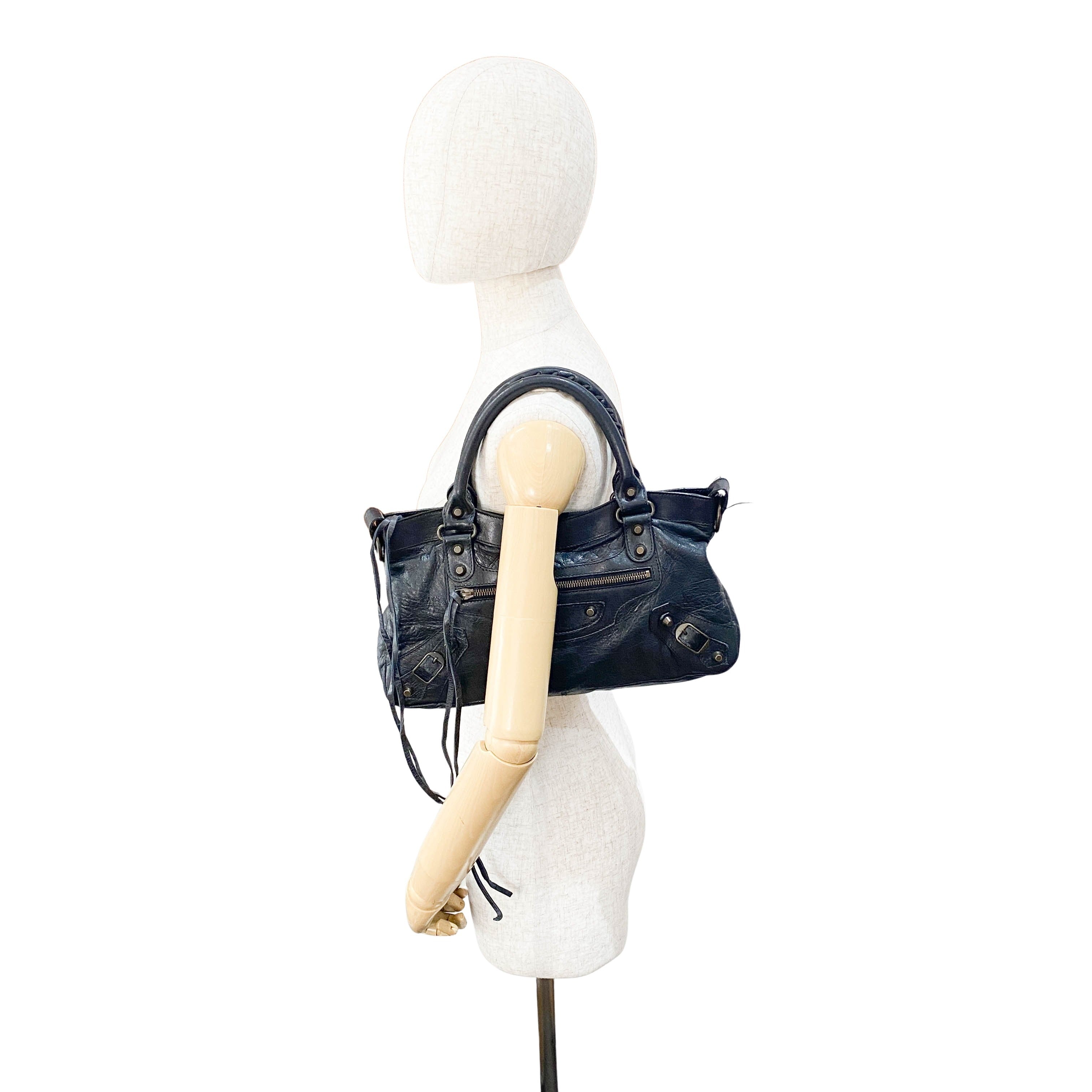 The First Black Leather Handlebag