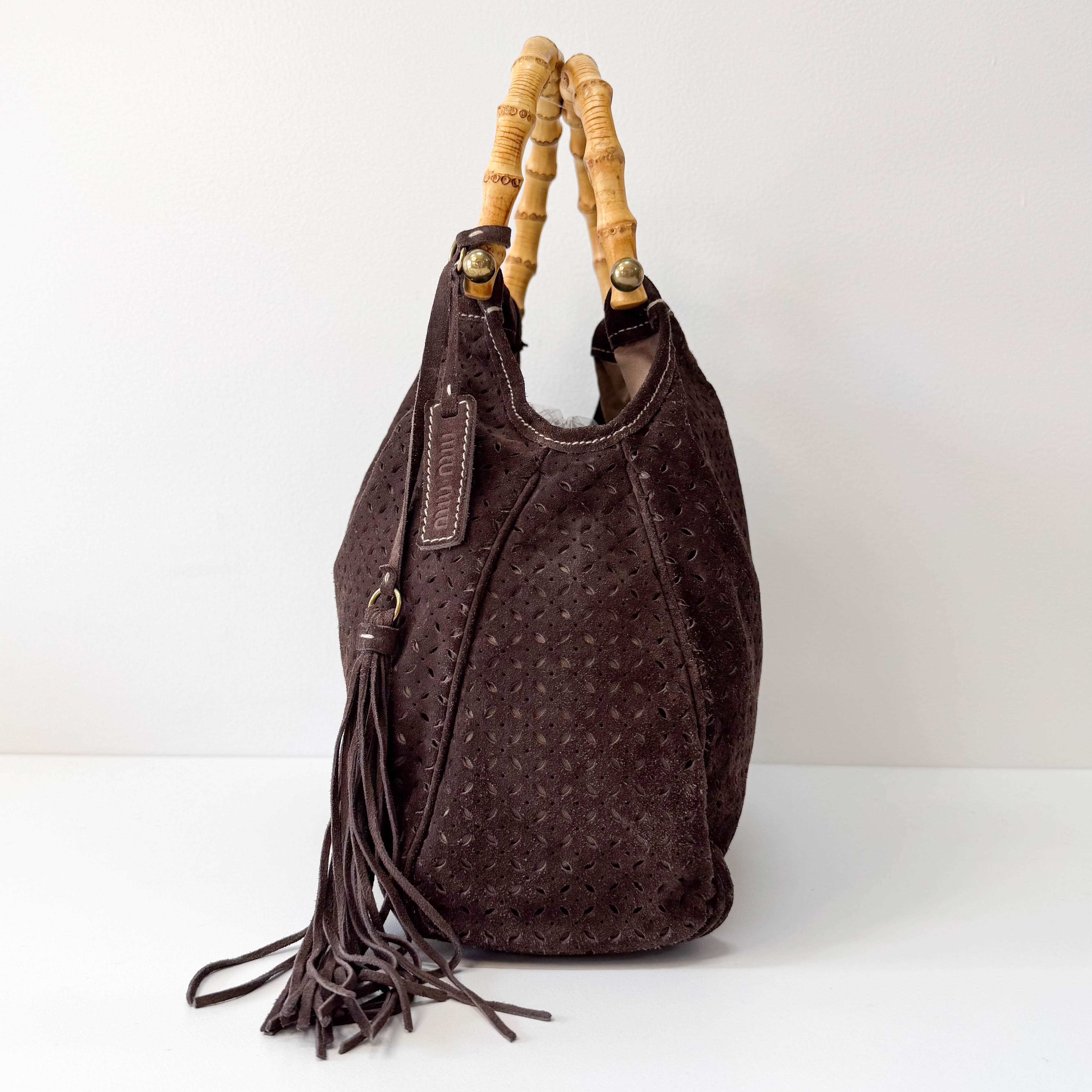 Laser Cut Suede Bamboo Handle Bag