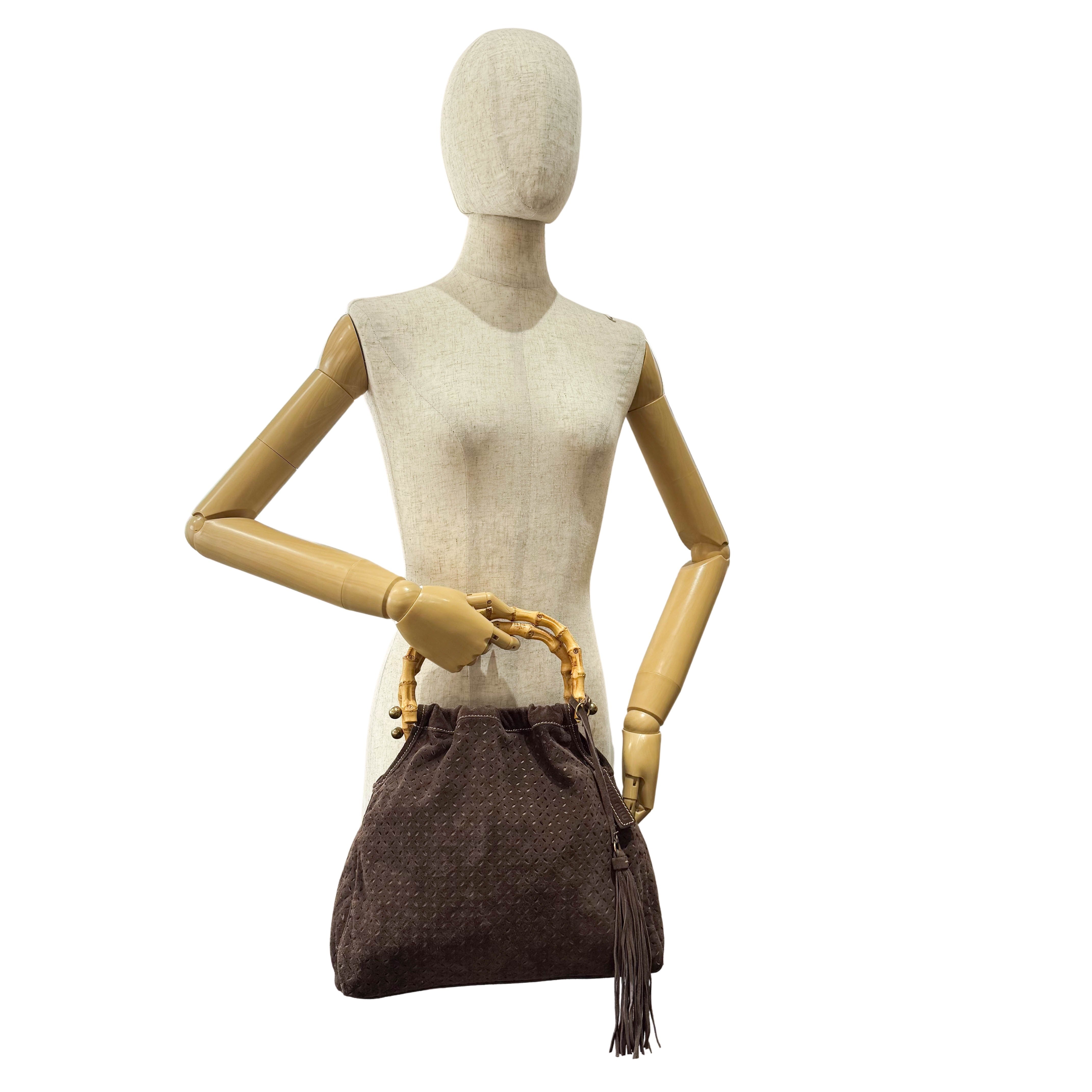 Laser Cut Suede Bamboo Handle Bag
