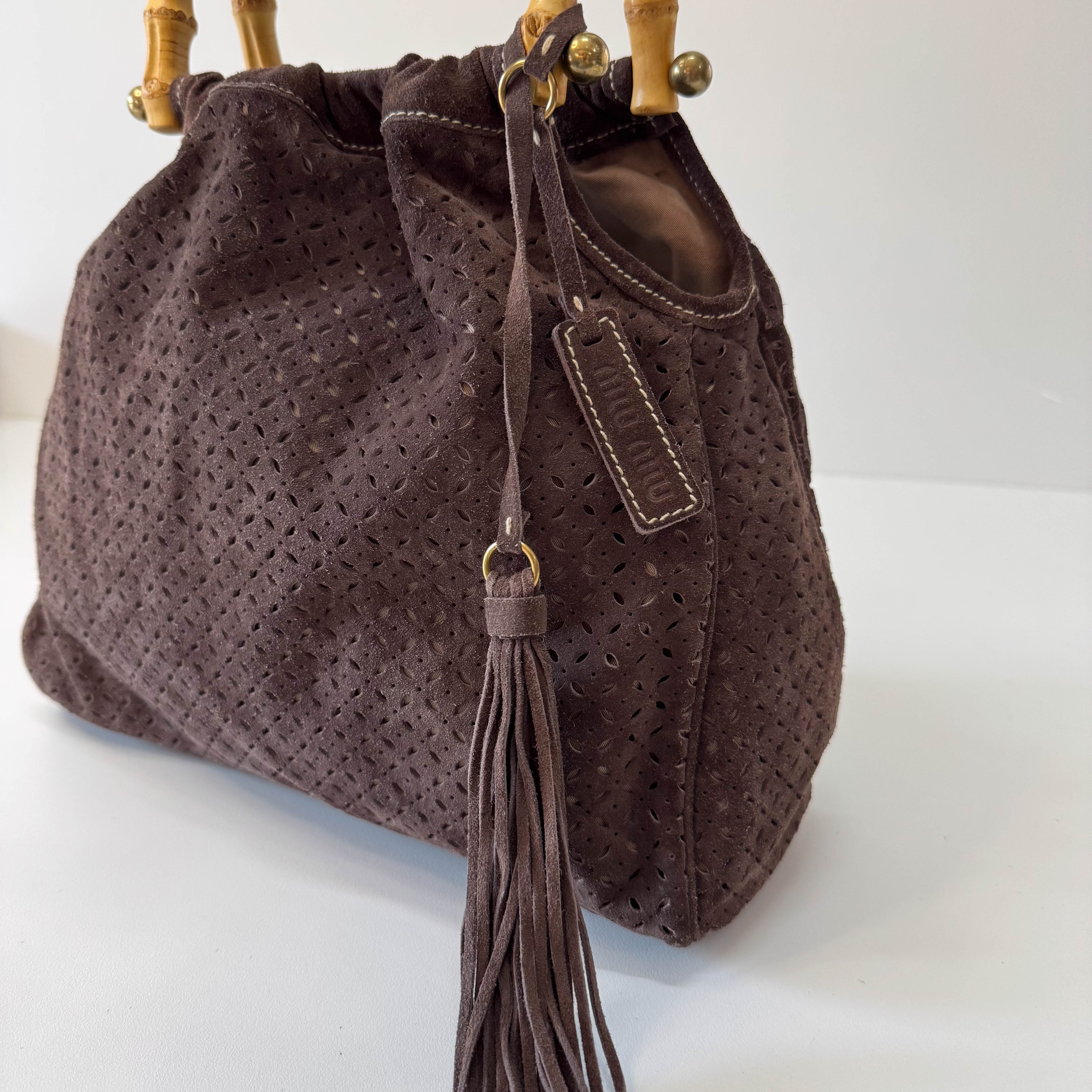 Laser Cut Suede Bamboo Handle Bag