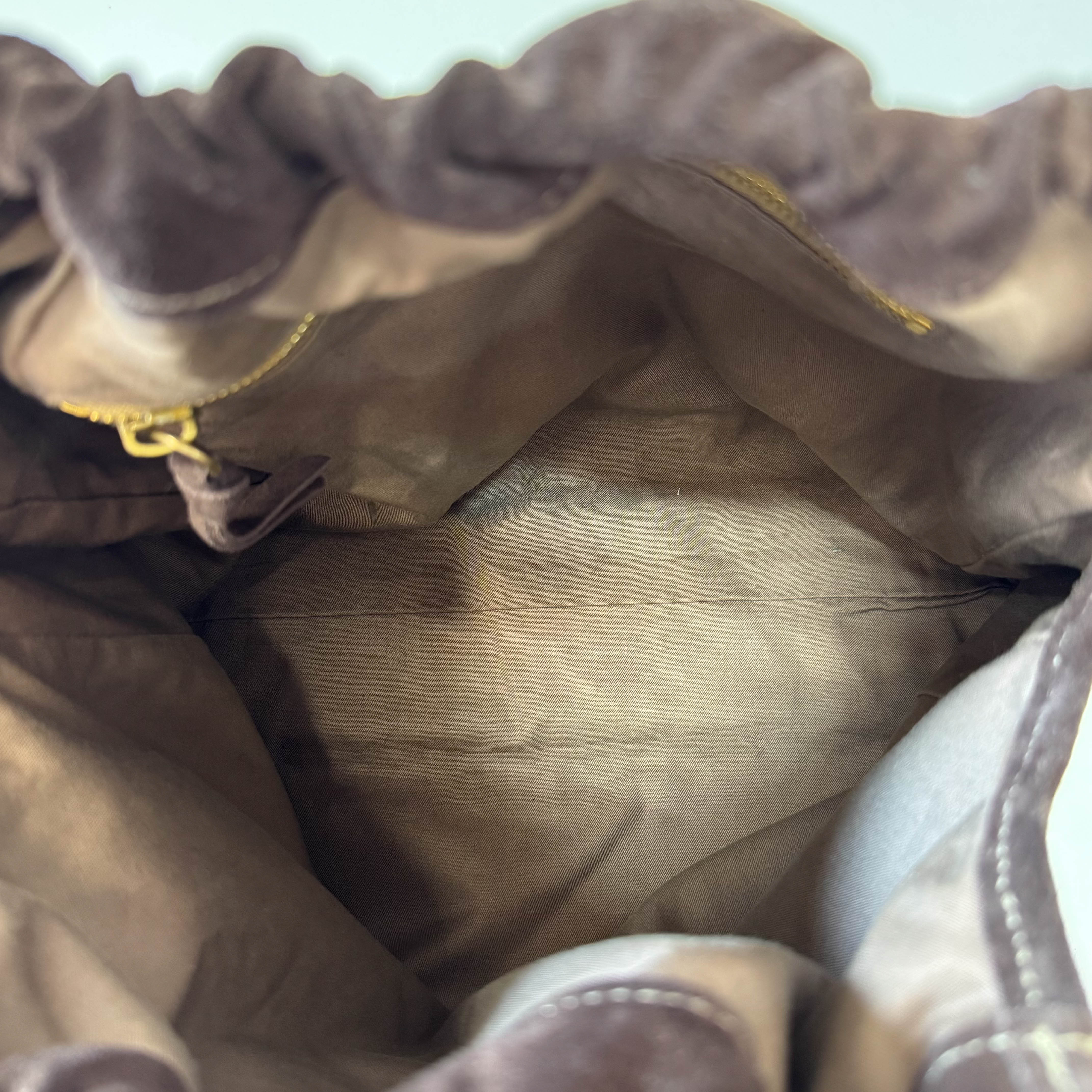 Laser Cut Suede Bamboo Handle Bag