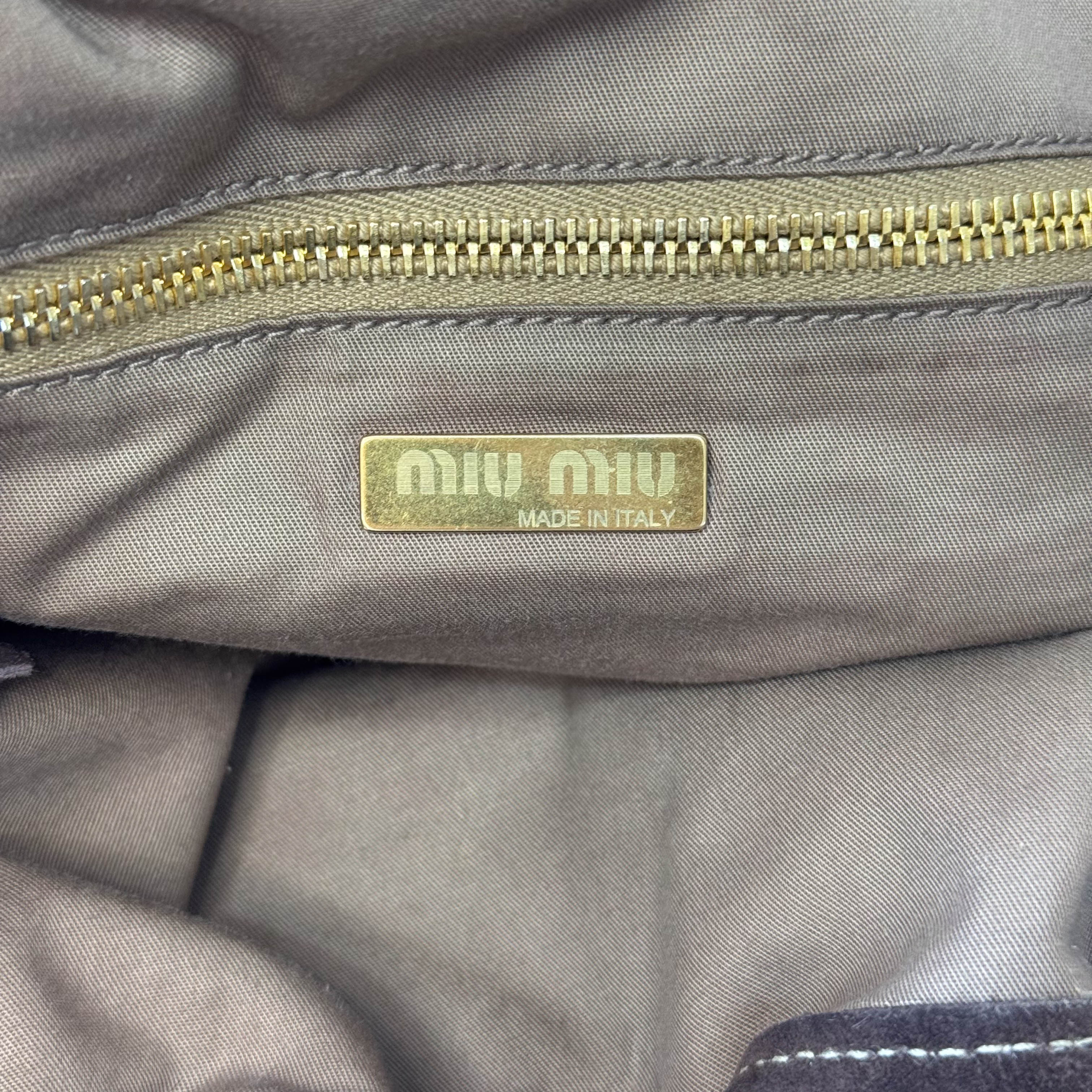 Laser Cut Suede Bamboo Handle Bag