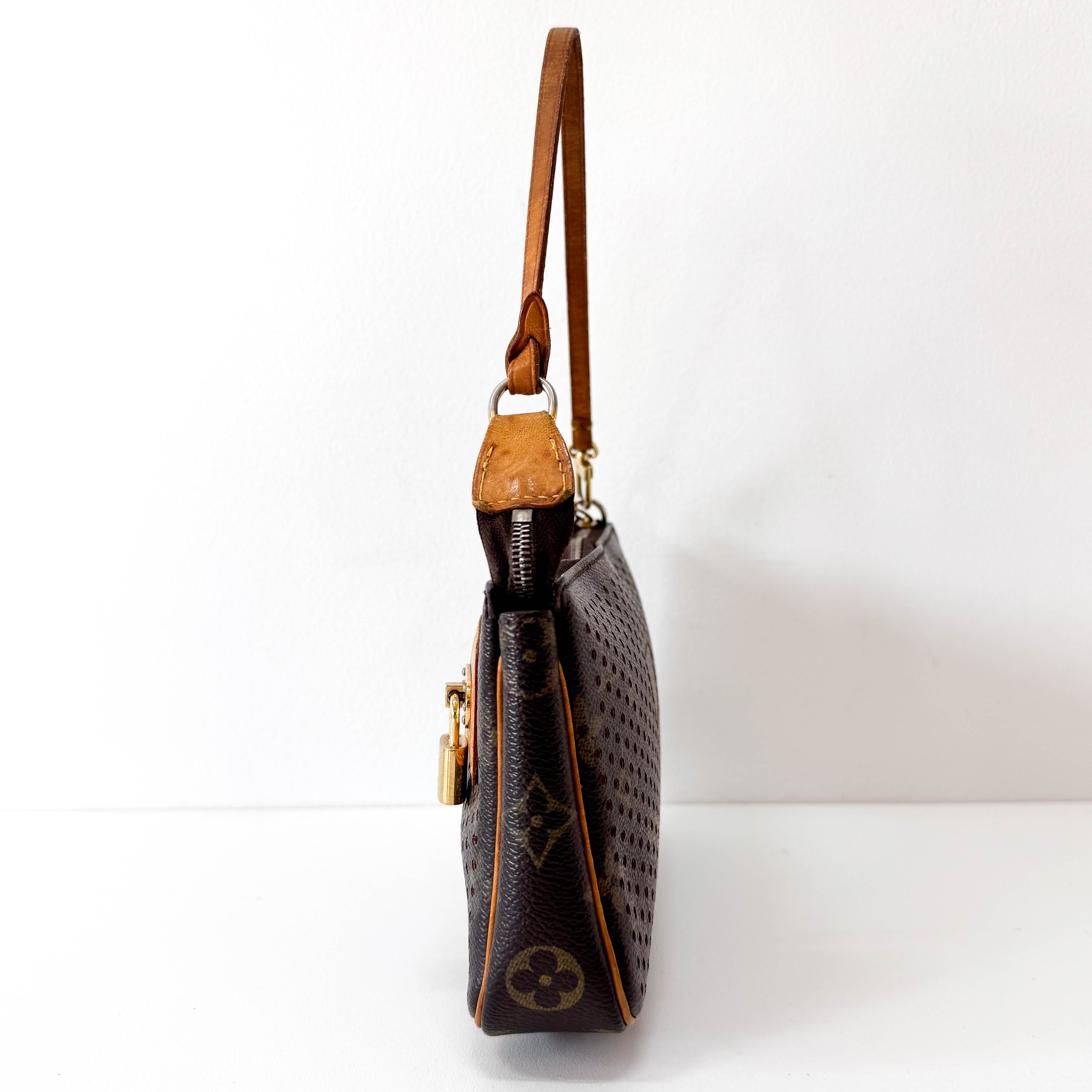 Monogram Brown Holes Leather Pochette Accesoire