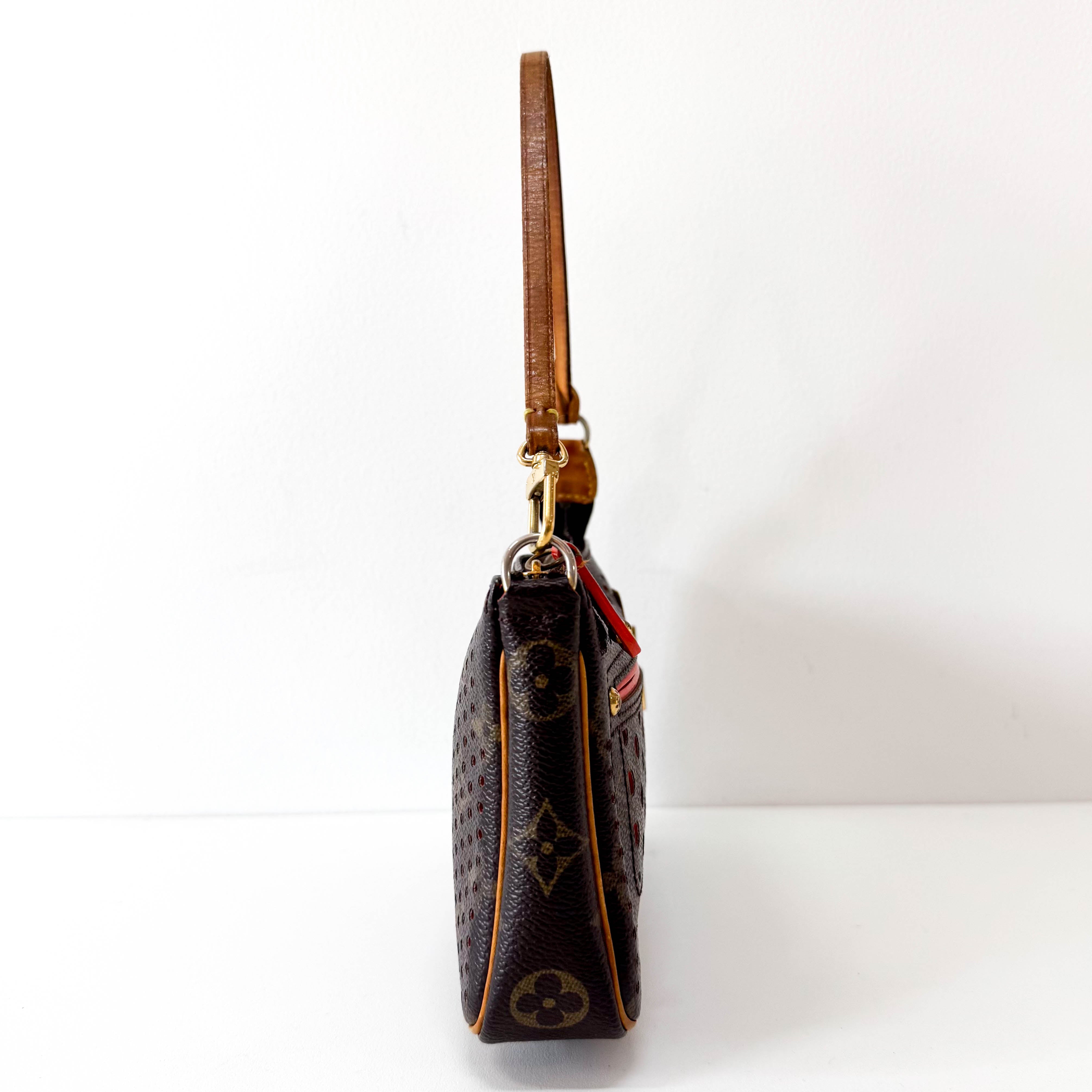 Monogram Brown Holes Leather Pochette Accesoire