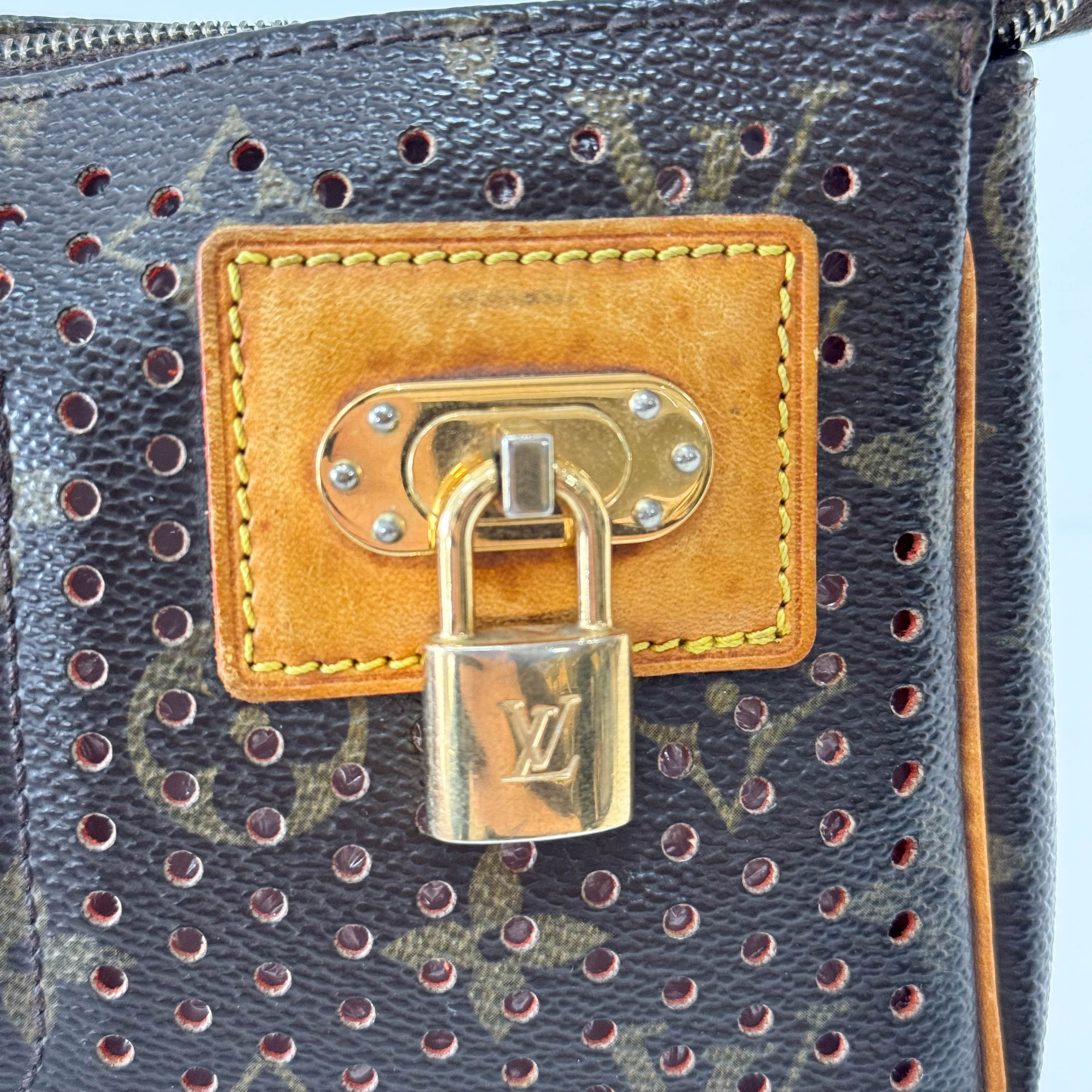 Monogram Brown Holes Leather Pochette Accesoire