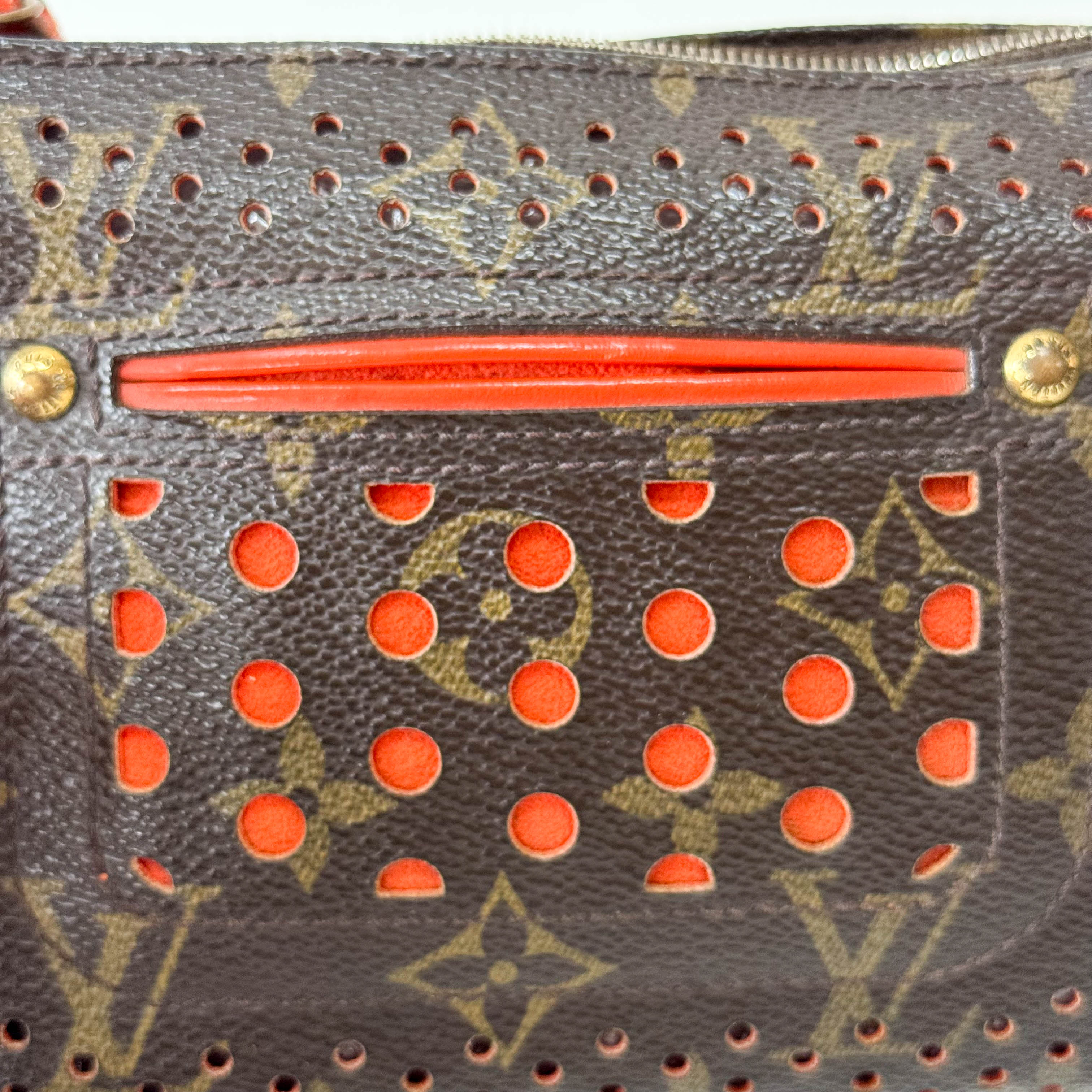 Monogram Brown Holes Leather Pochette Accesoire